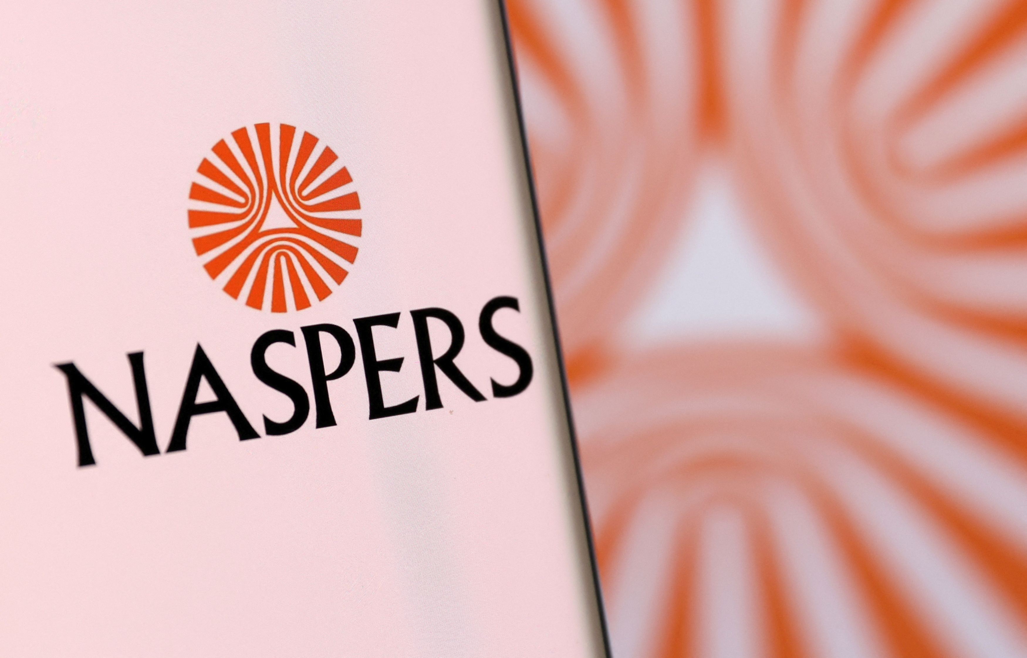 Illustration shows smartphone with Naspers' logo