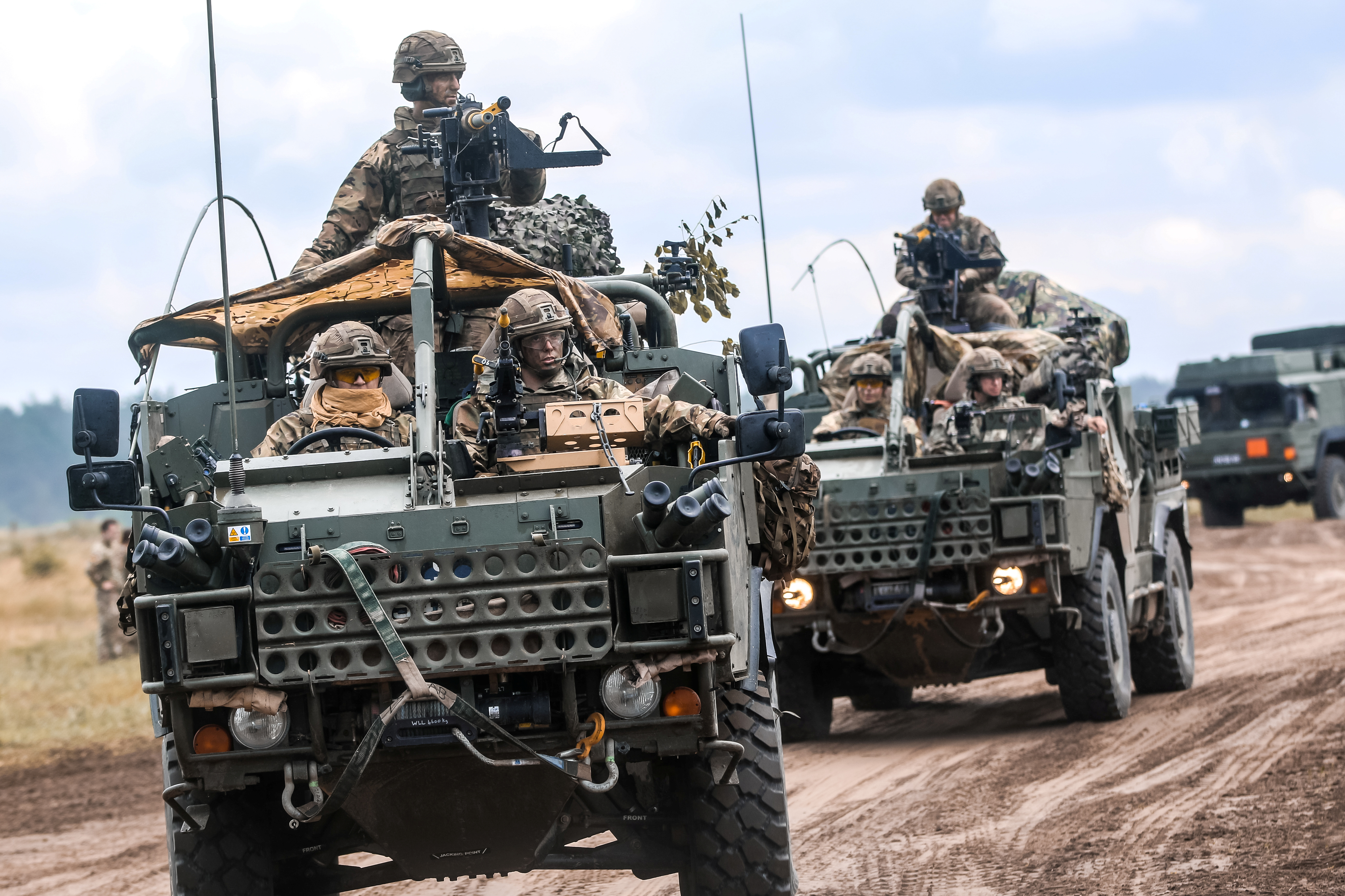 A convoy Jackal vehicles with the British Army's 1st The Queen's Dragoon Guards move to begin a multinational training event in Poland