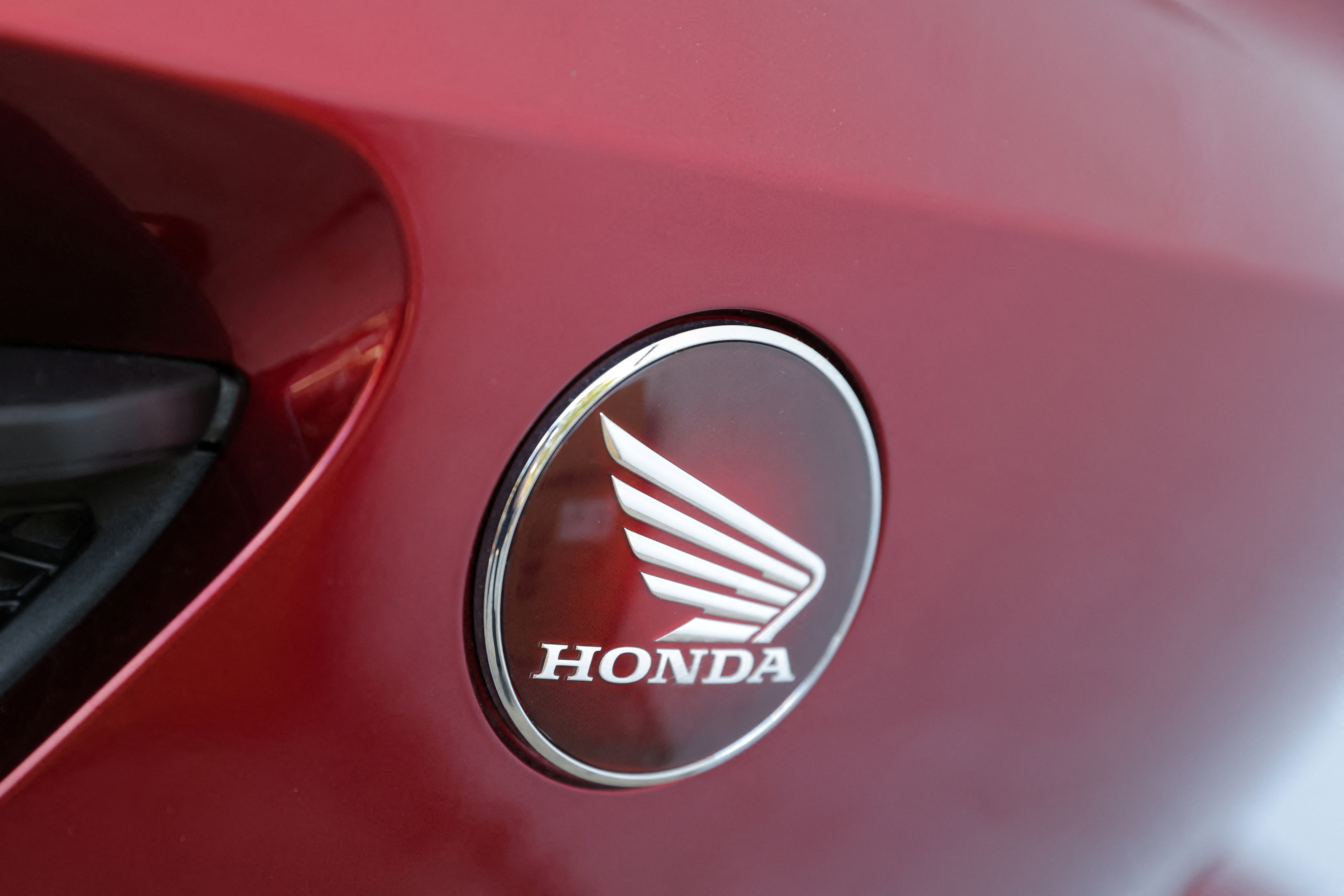 Branding is seen on a Honda motorcycle at New York Honda Yamaha in Queens, New York City