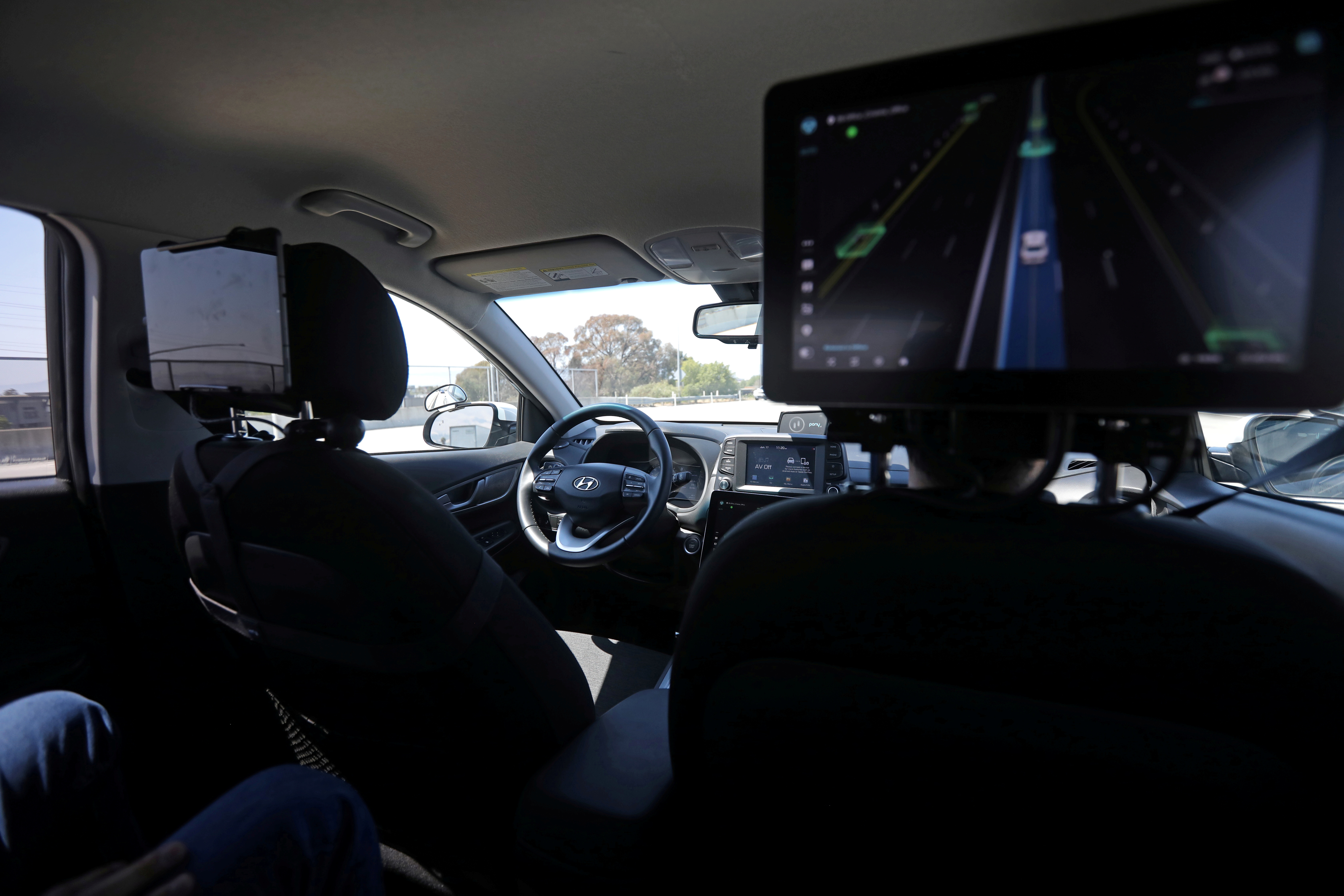 An empty driver's seat is seen inside a vehicle equipped with Pony.ai's self-driving technology during a demonstration in Fremont
