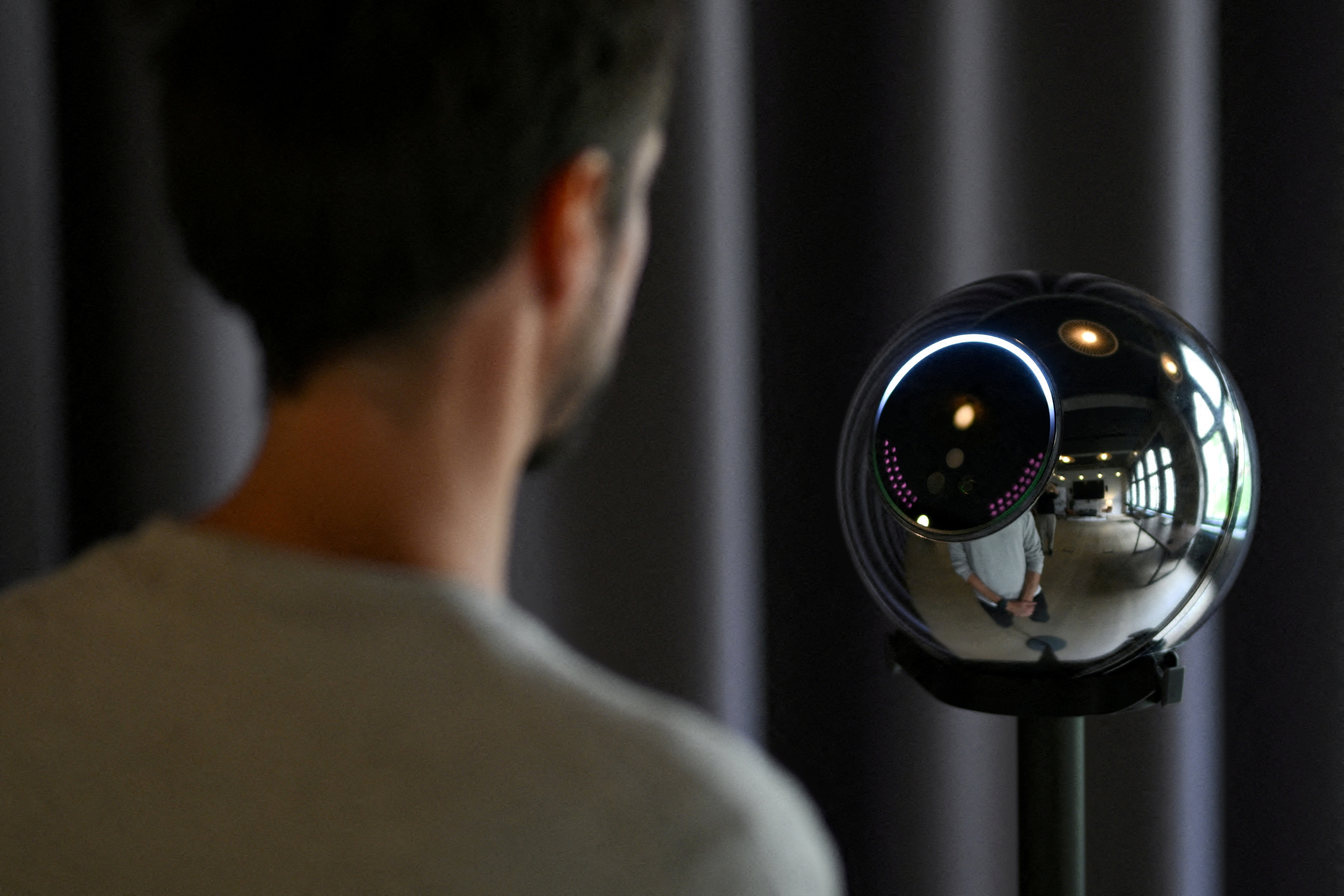 Digital coins in exchange for an iris scan: biometric imaging device Orb
