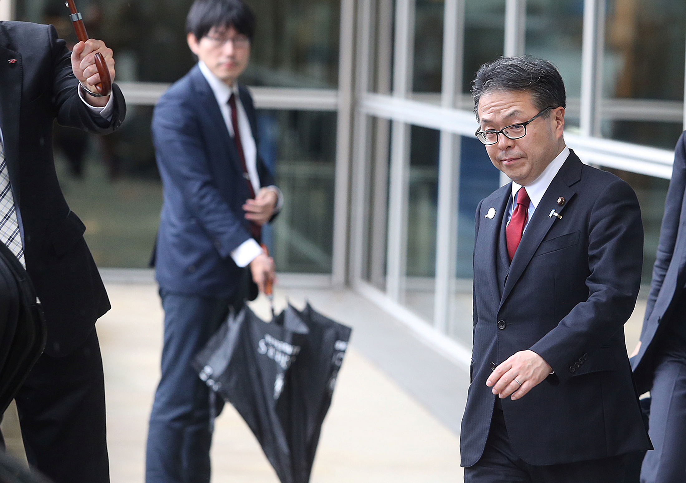 Japan's Minister of Economy, Trade and Industry Hiroshige Seko leaves the European Commission headquarters after a meeting on steel overcapacity, in Brussels