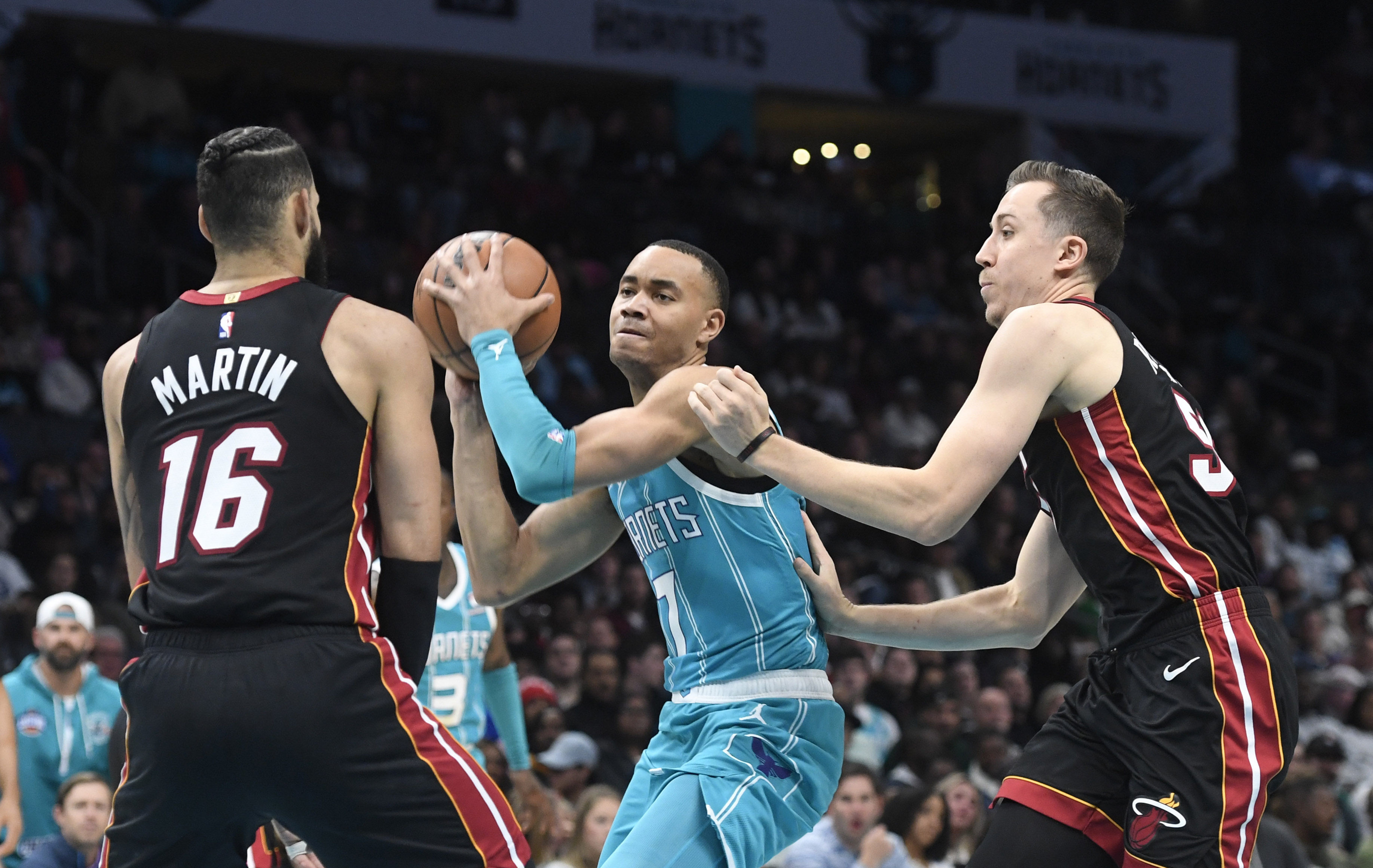 Heat survive late wobble, hold off Hornets | Reuters