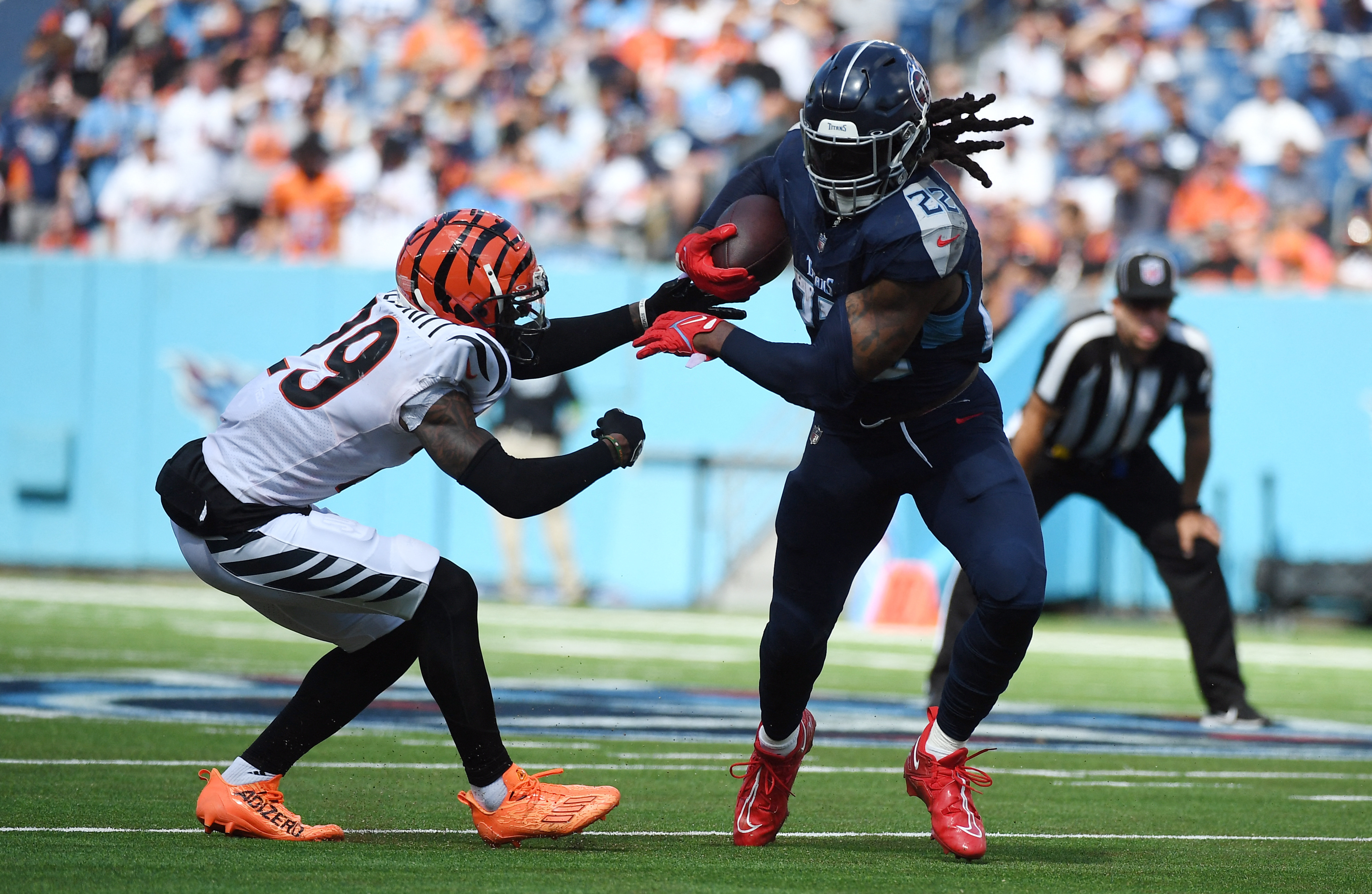 Bengals' Tee Higgins suffers serious rib injury in Titans loss