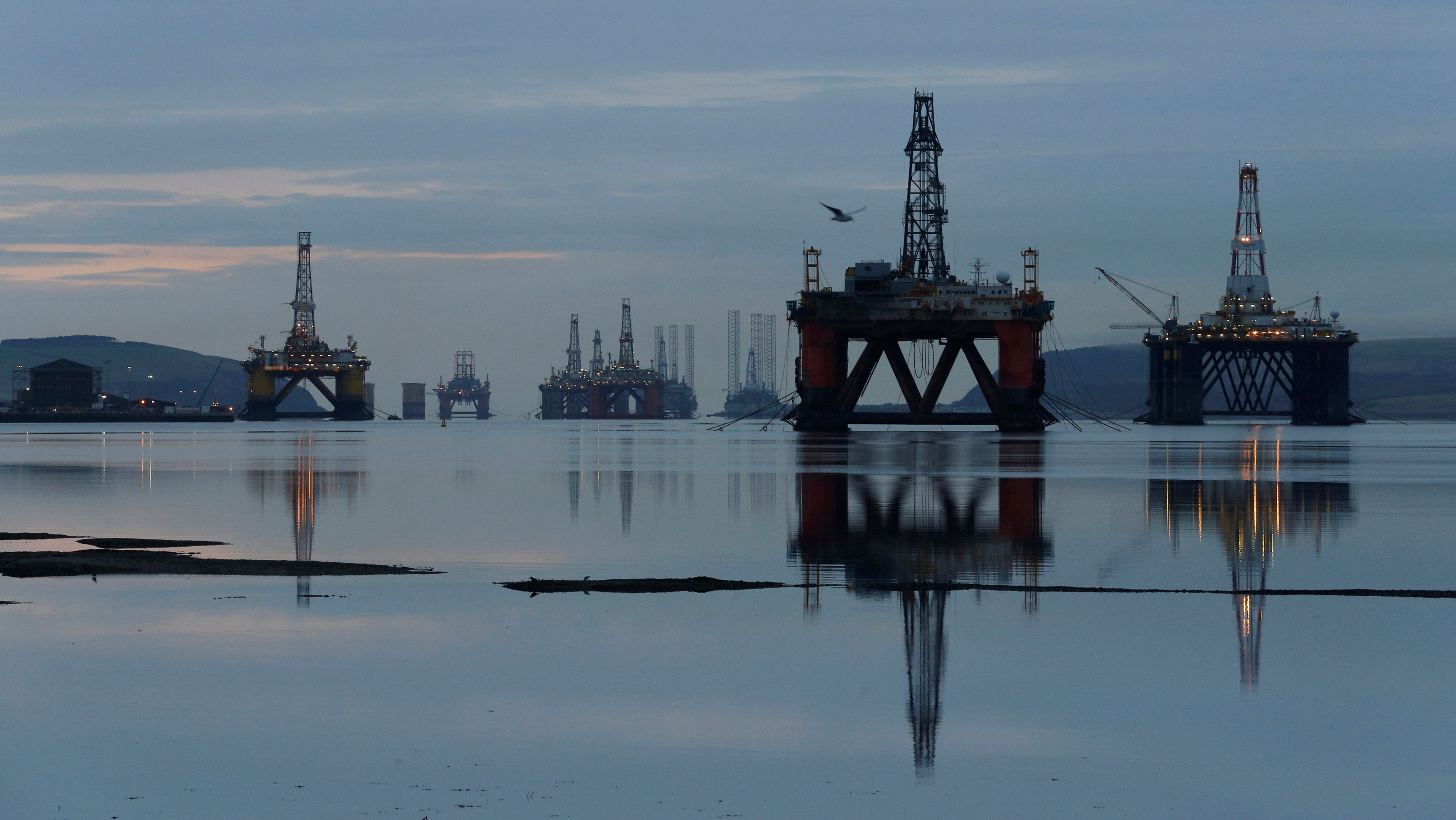 Drilling rigs are parked up in the Cromarty Firth near Invergordon, Scotland