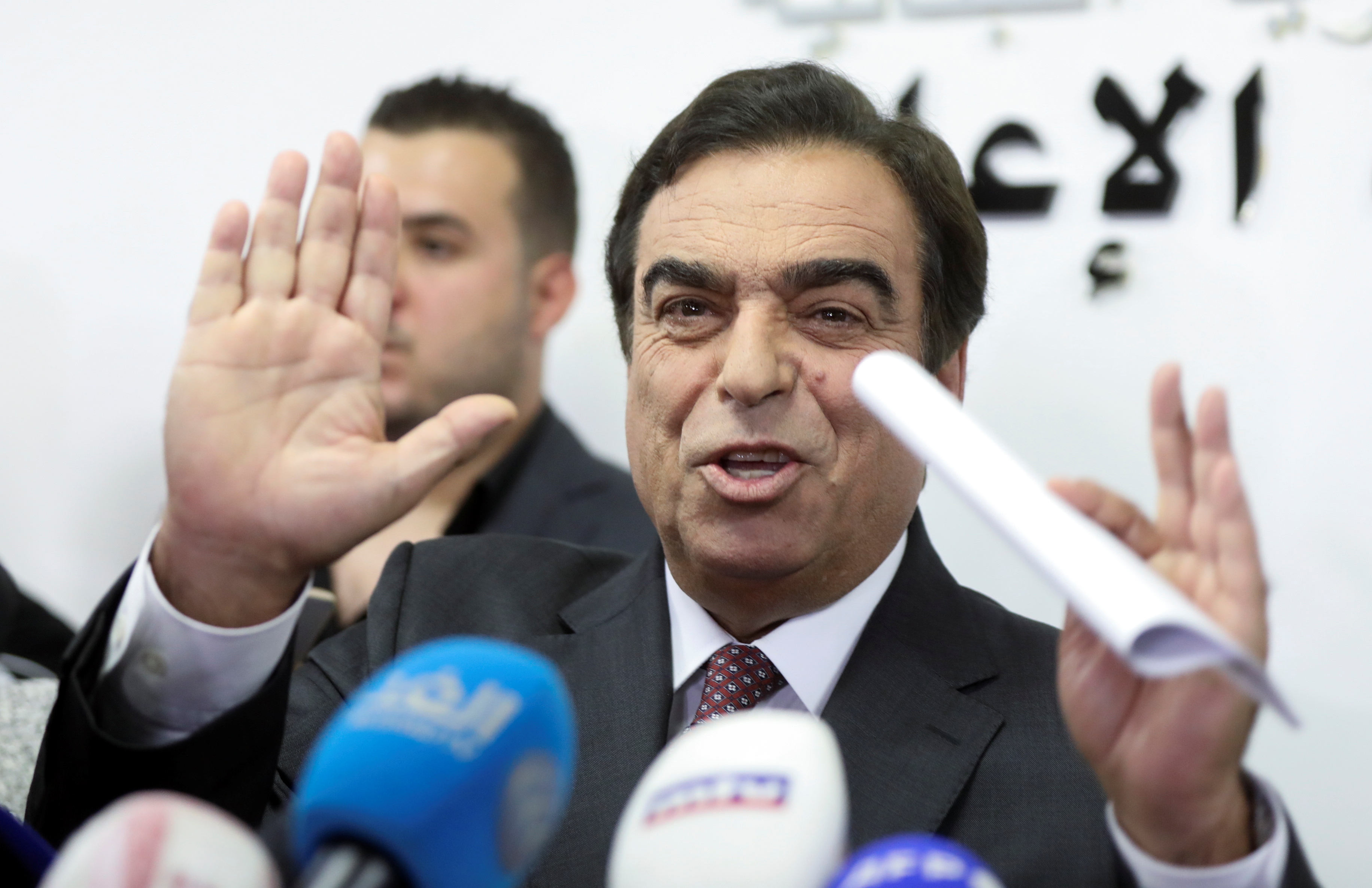 Lebanese Information Minister George Kordahi gestures during a news conference announcing his resignation in Beirut, Lebanon December 3, 2021. REUTERS/Mohamed Azakir