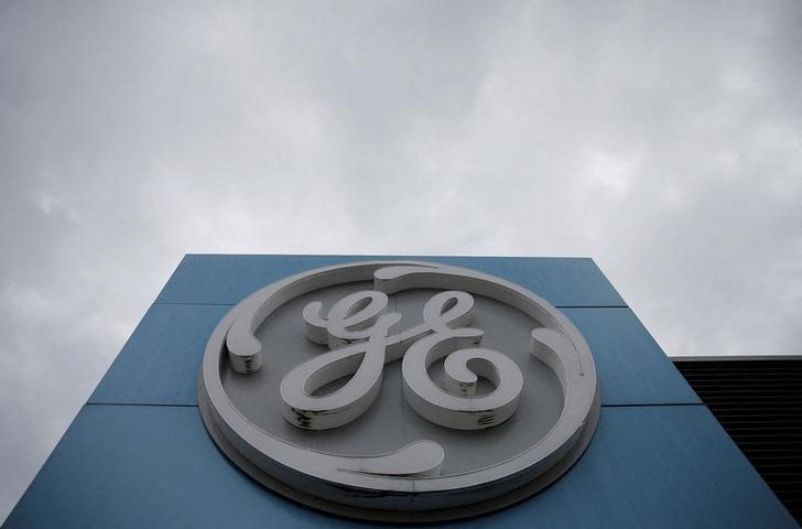 The logo of U.S. conglomerate General Electric is seen on the company building. REUTERS/Vincent Kessler