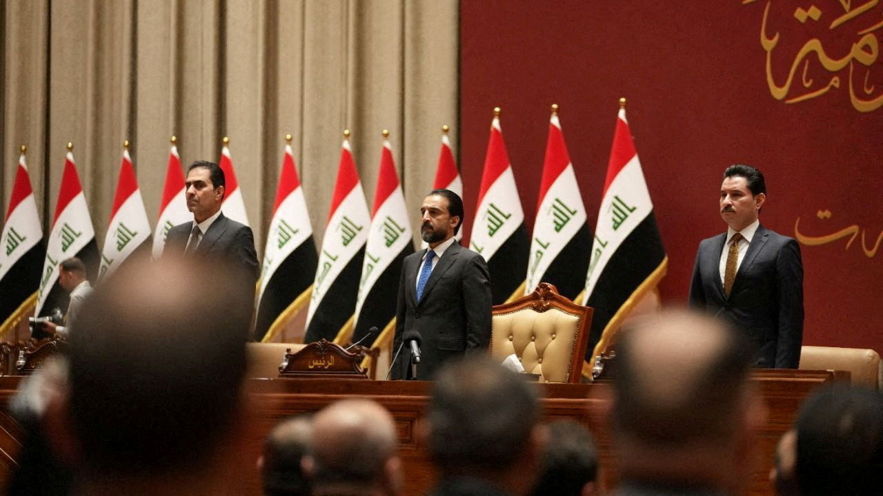 Iraqi speaker of Parliament Mohammed al-Halbousi appears during a vote in Sudani's cabinet at the parliament in Baghdad