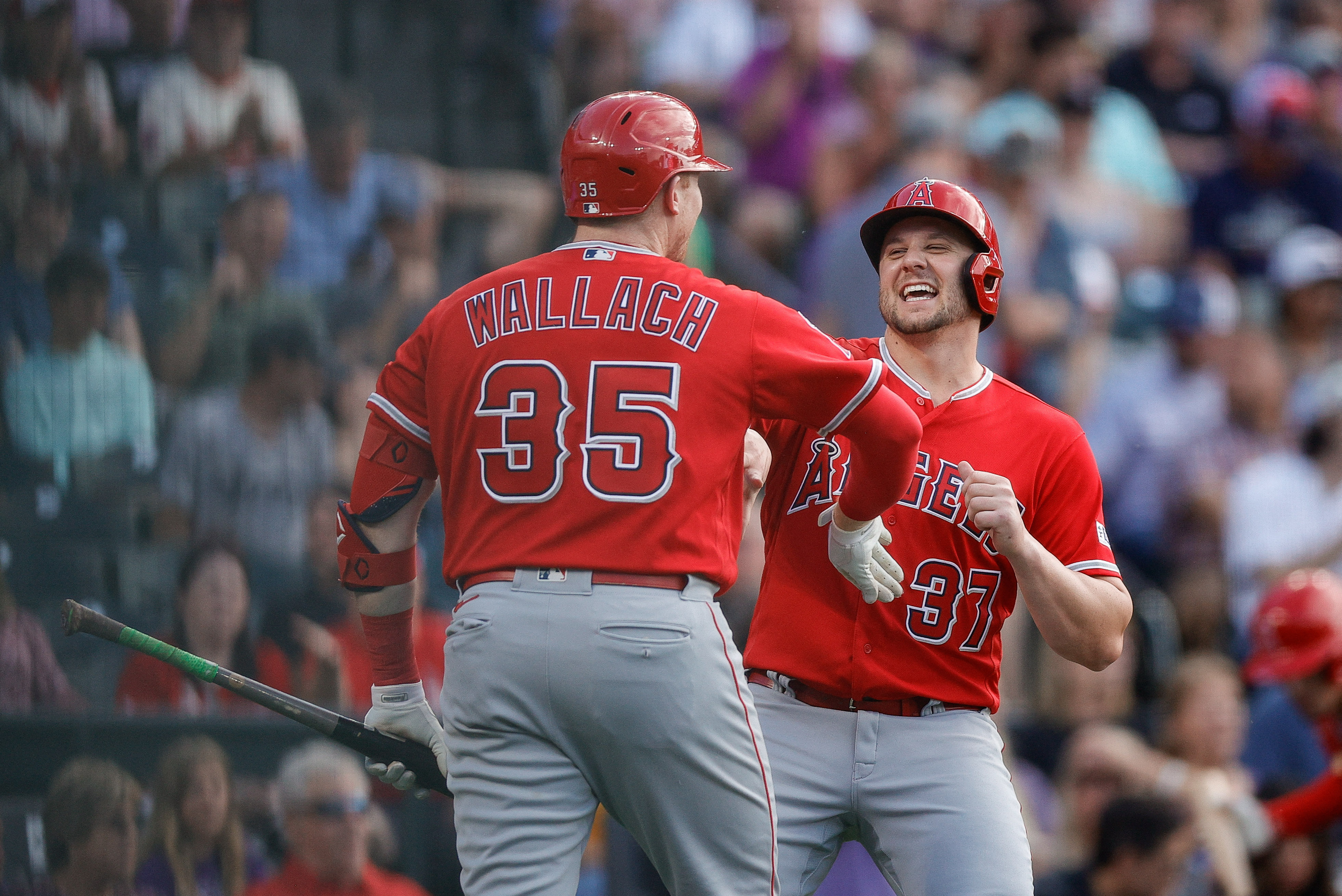 Colorado Rockies' Elias Diaz gestures after hitting a grand slam off Los  Angeles Angels relief pitcher Chris Devenski during the eighth inning of a  baseball game Friday, June 23, 2023, in Denver. (