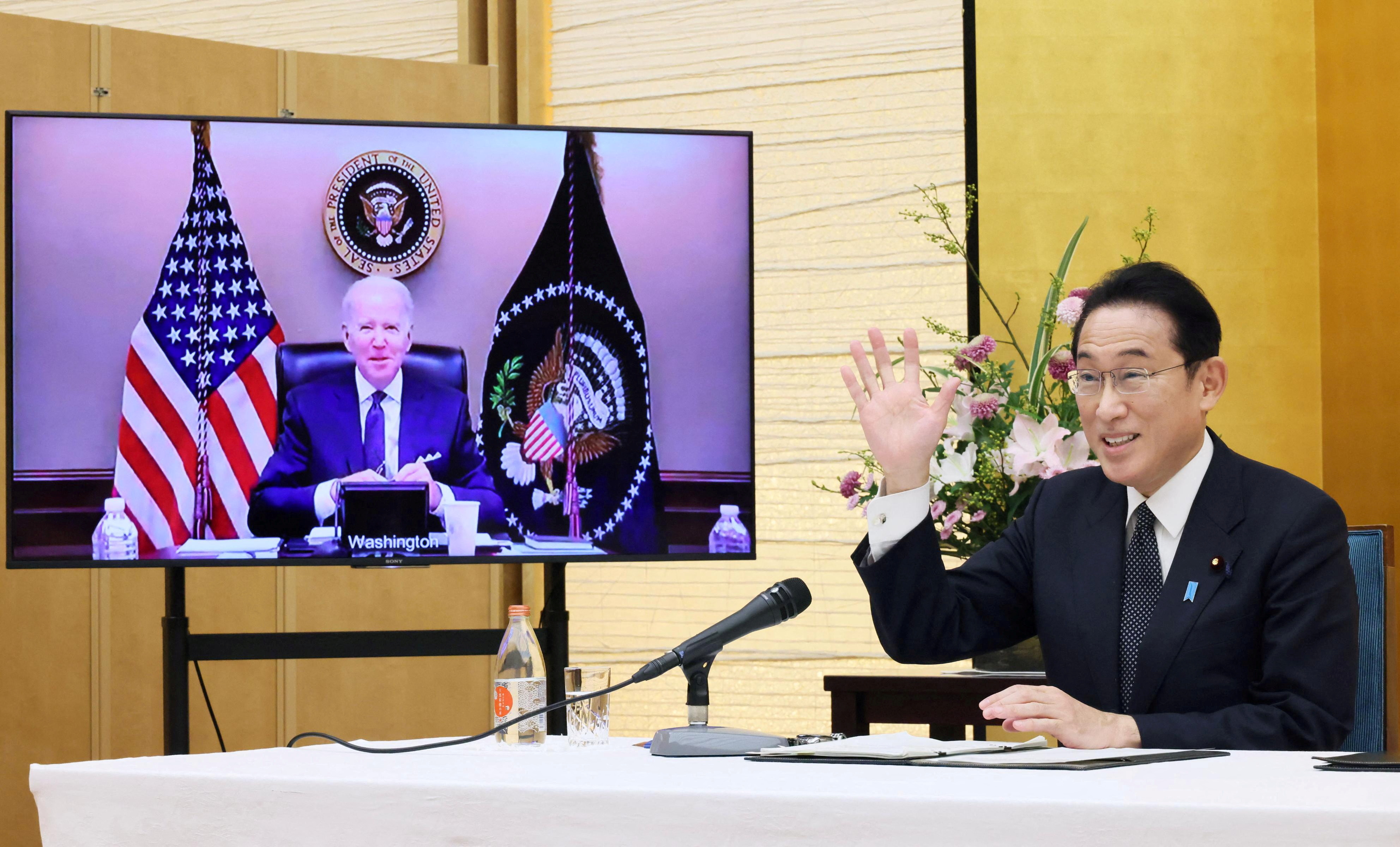 Japan's Prime Minister Fumio Kishida attends a virtual meeting with the U.S. President Joe Biden in Tokyo