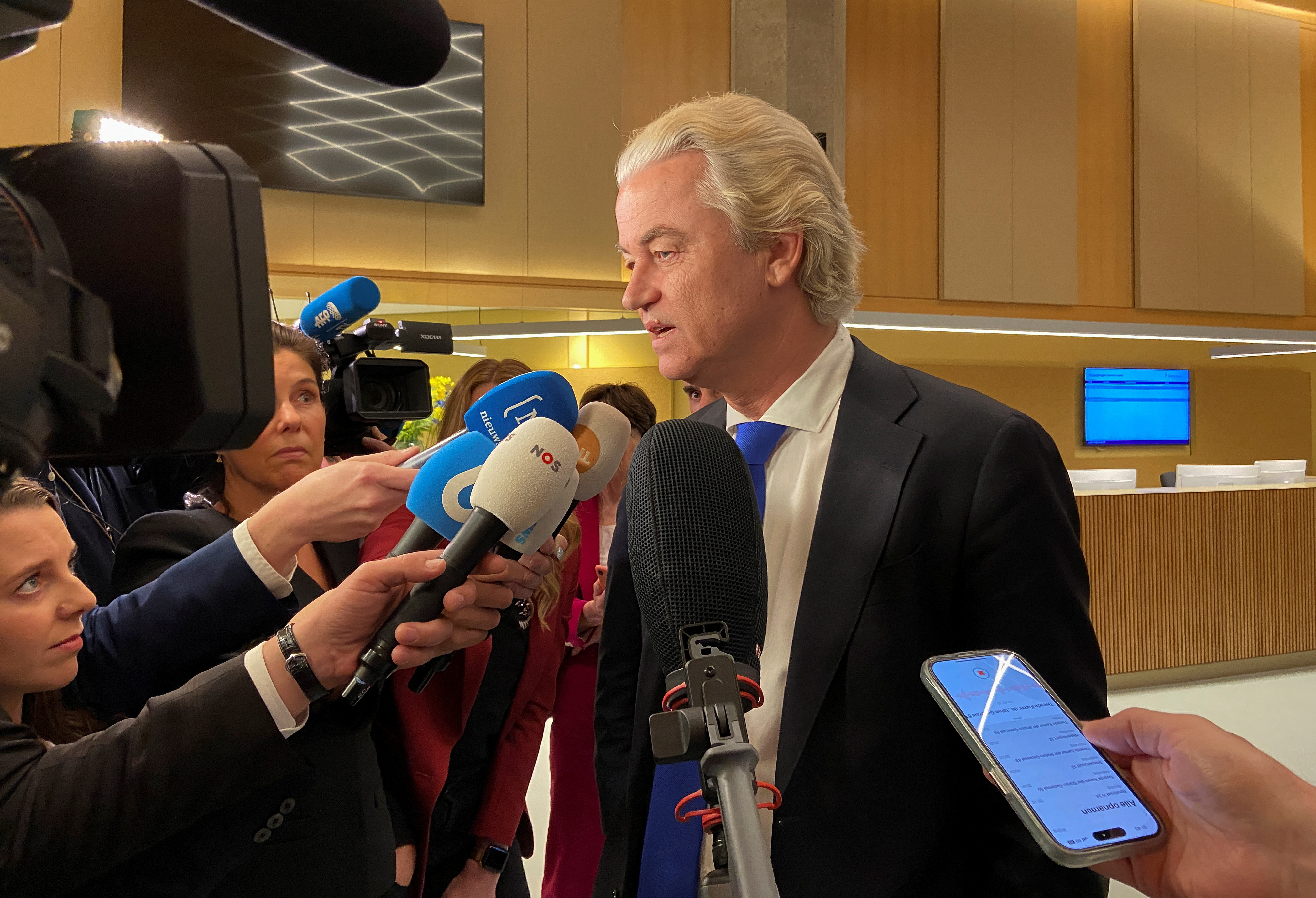 Dutch far-right leader Geert Wilders speaks to media in The Hague