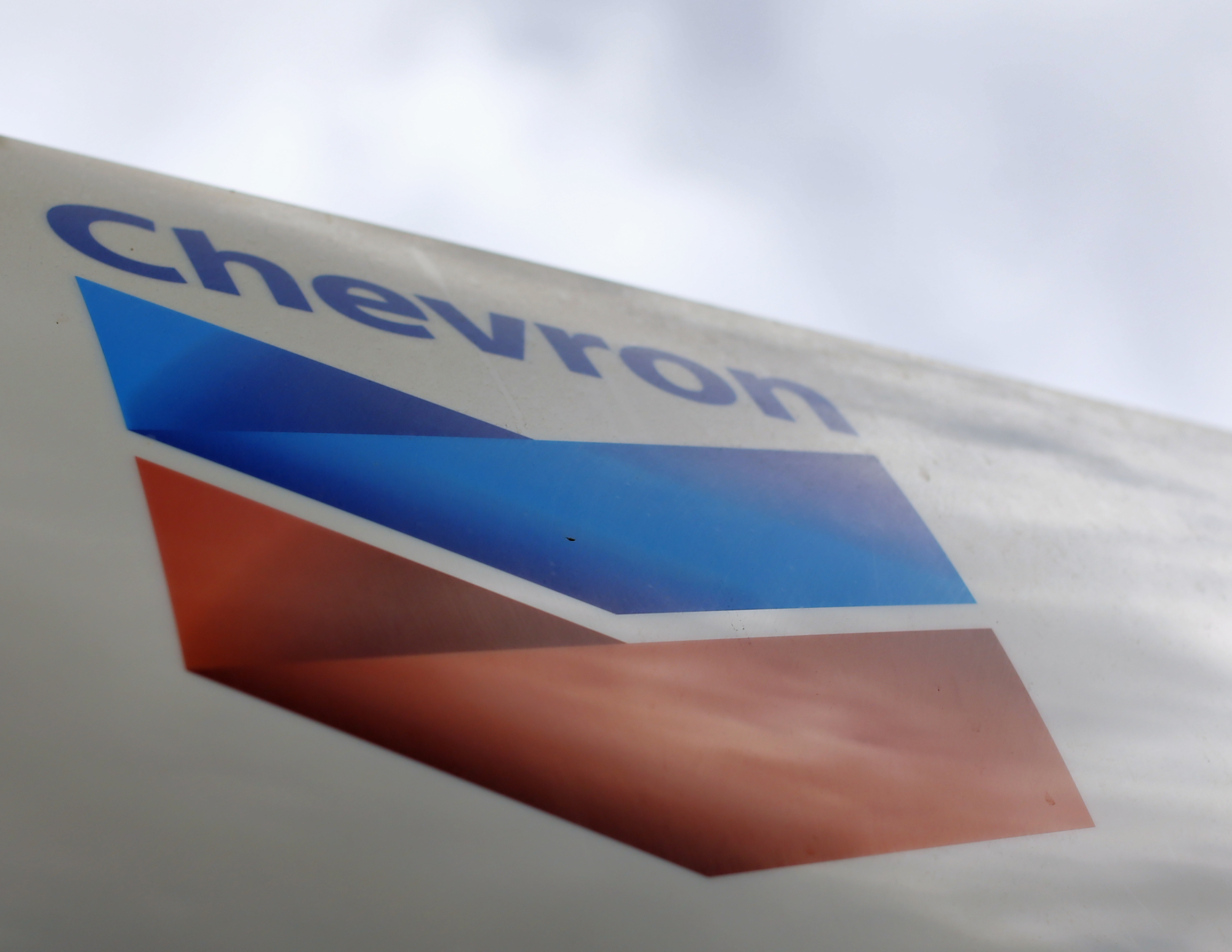 A Chevron gas station sign is shown at one of their retain gas stations in Cardiff, California