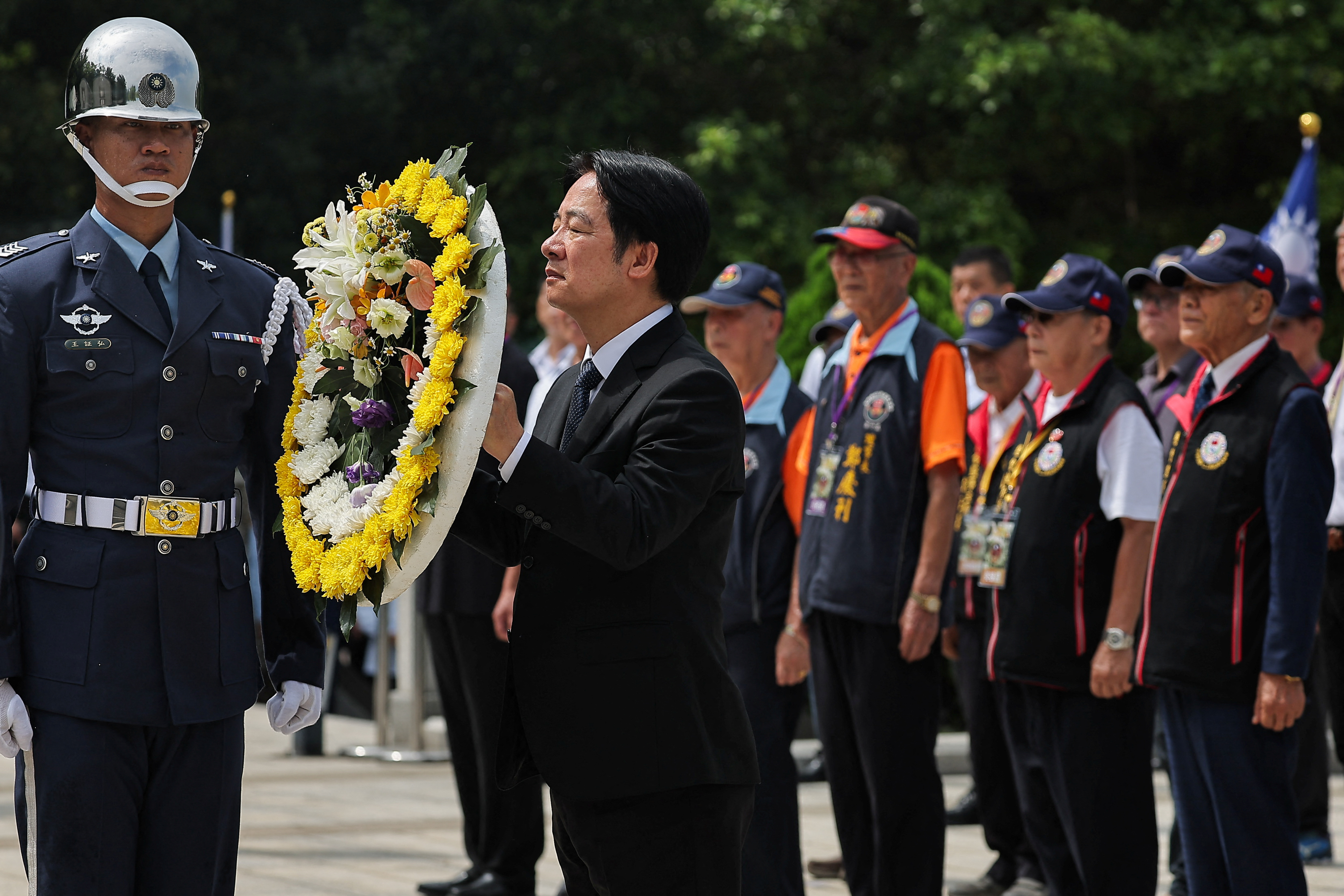 On frontline island, Taiwan president rejects China's rule for freedom | Reuters