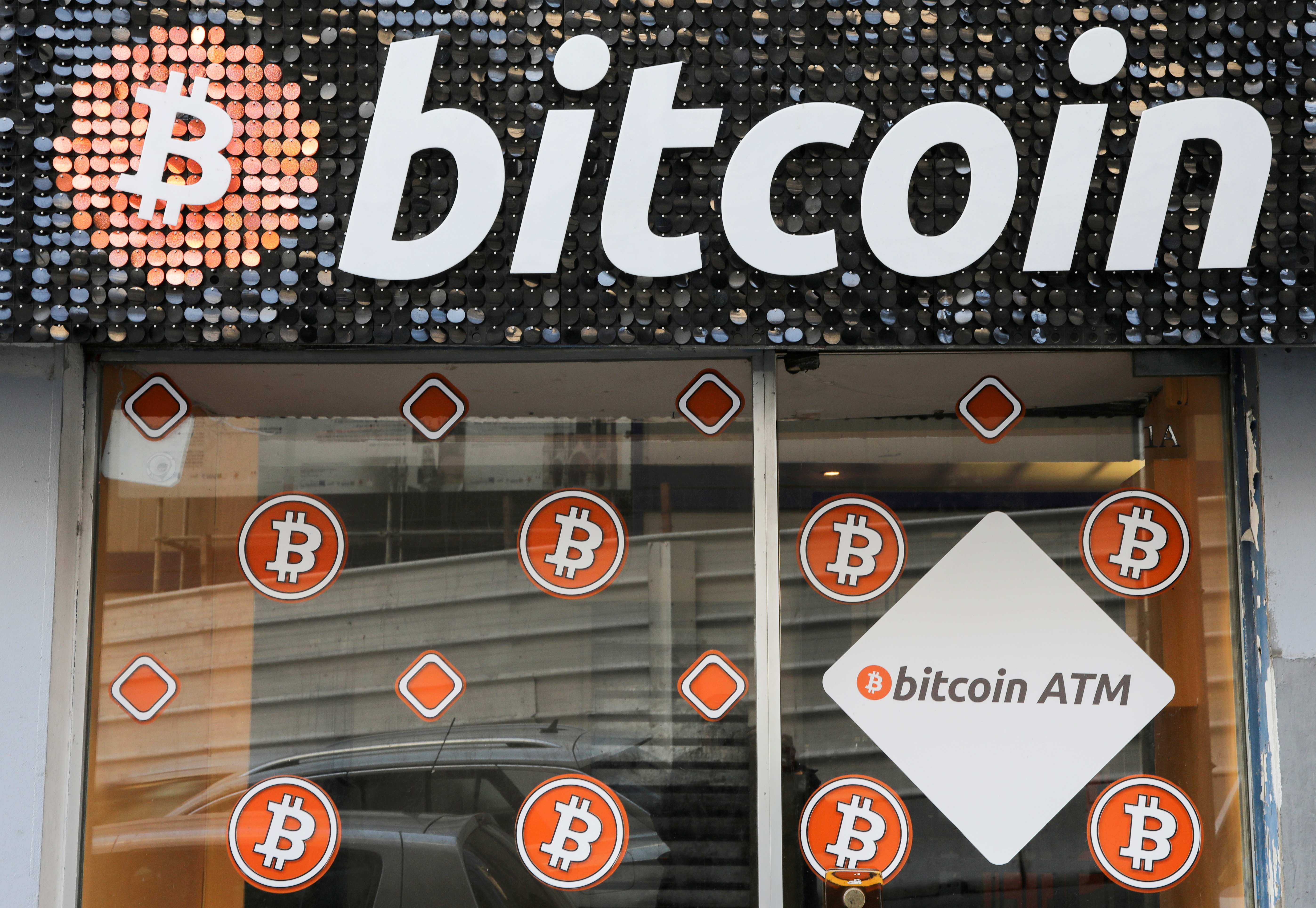 A Bitcoin digital currency ATM shop is seen in Marseille