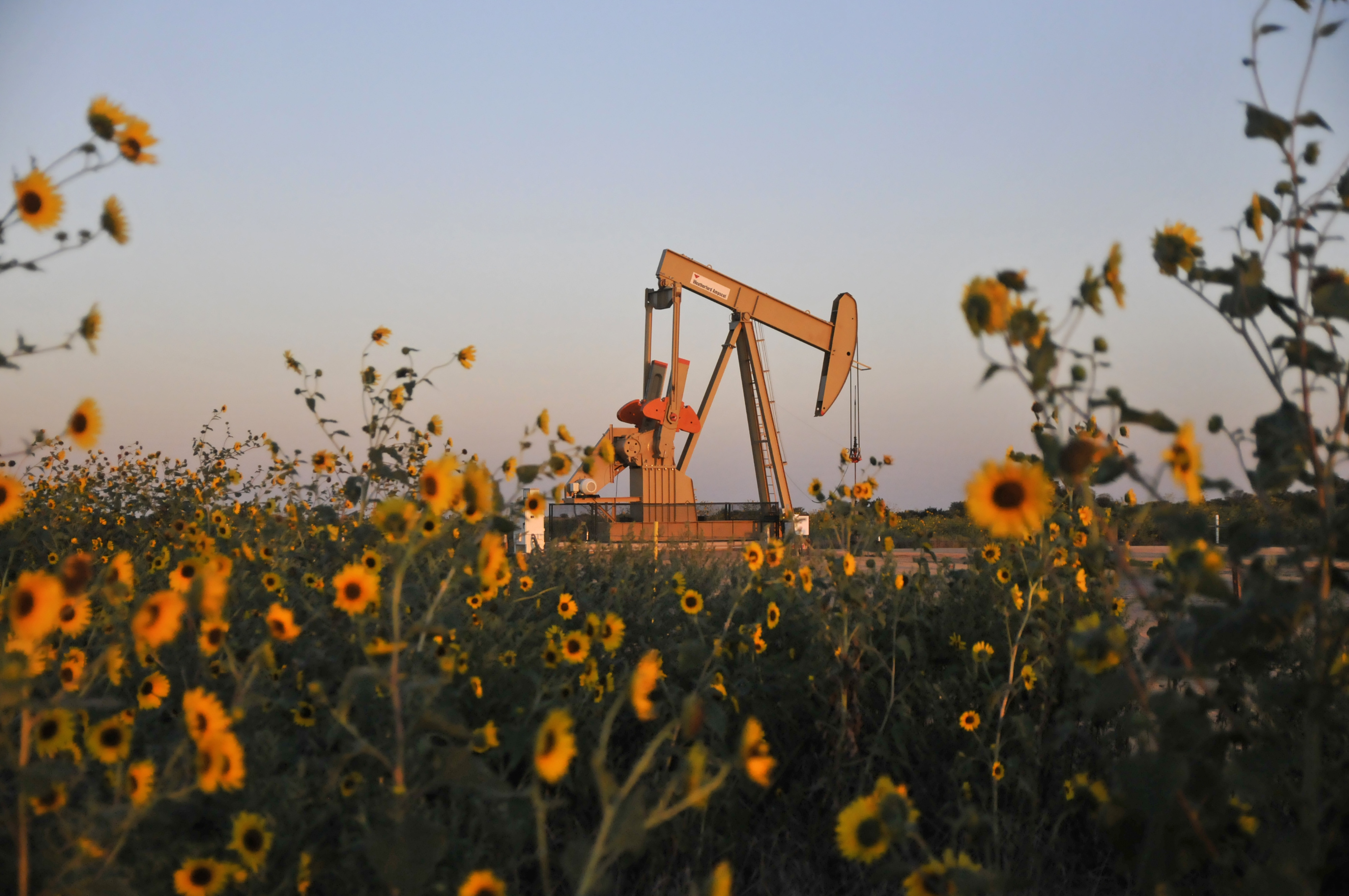 A pump jack operates at a well site leased by Devon Energy Production Company near Guthrie, Oklahoma