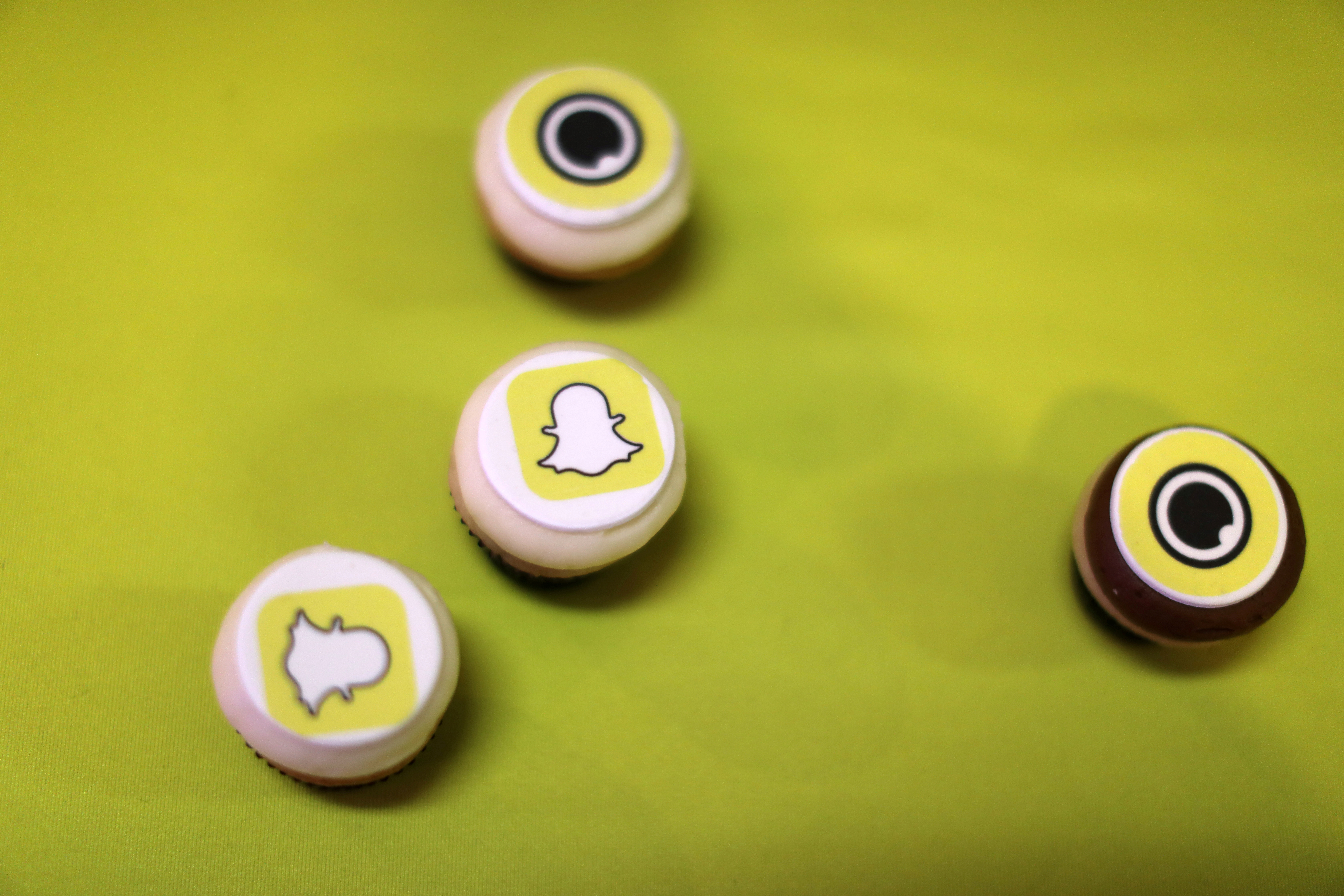 The logo of messaging app Snapchat is seen at a booth at TechFair LA, a technology job fair, in Los Angeles