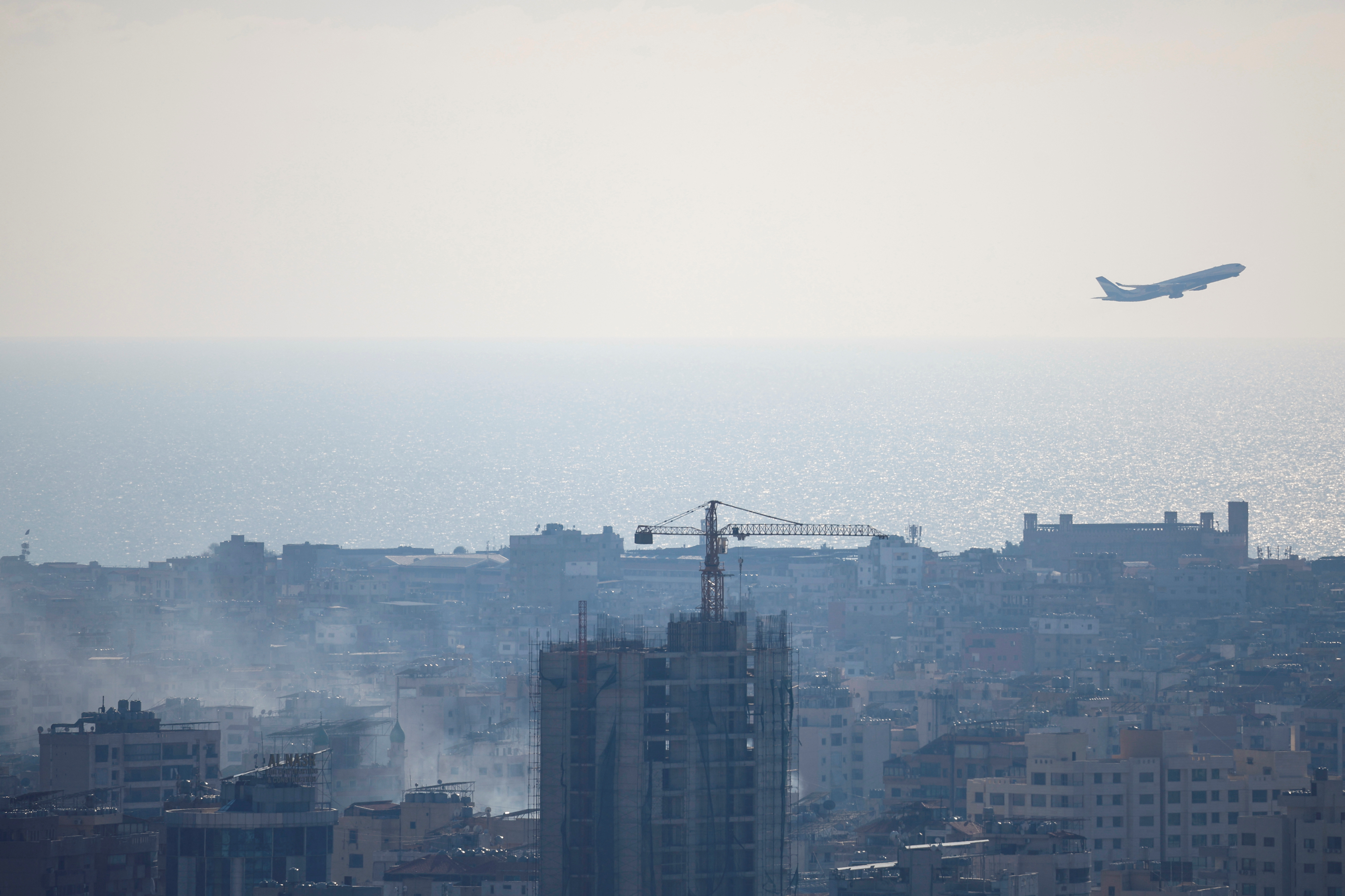 Smoke from Israeli strike billows near airplane takeoff from Beirut's Rafic Hariri International Airport