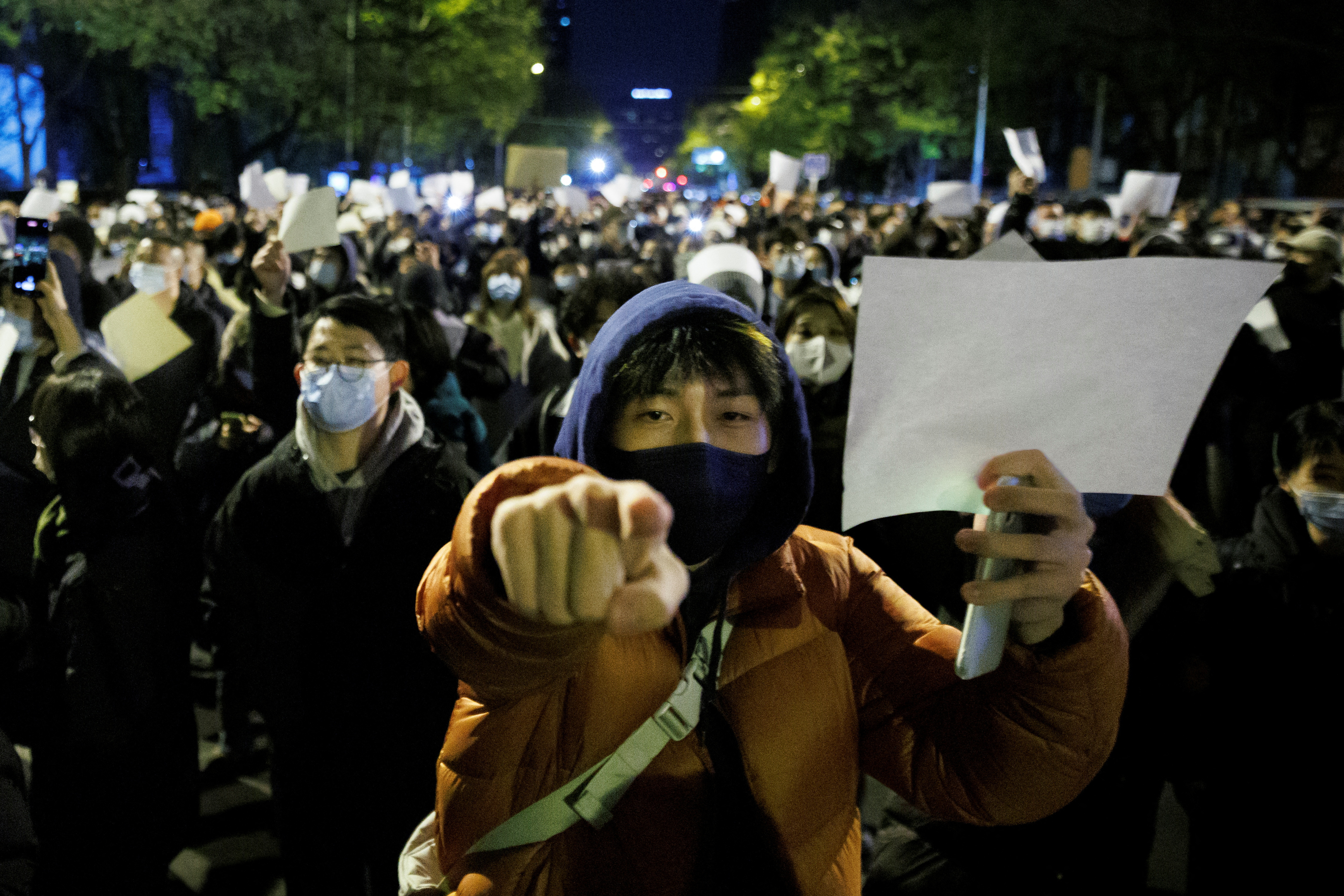 Clashes in Shanghai as COVID protests flare across China | Reuters
