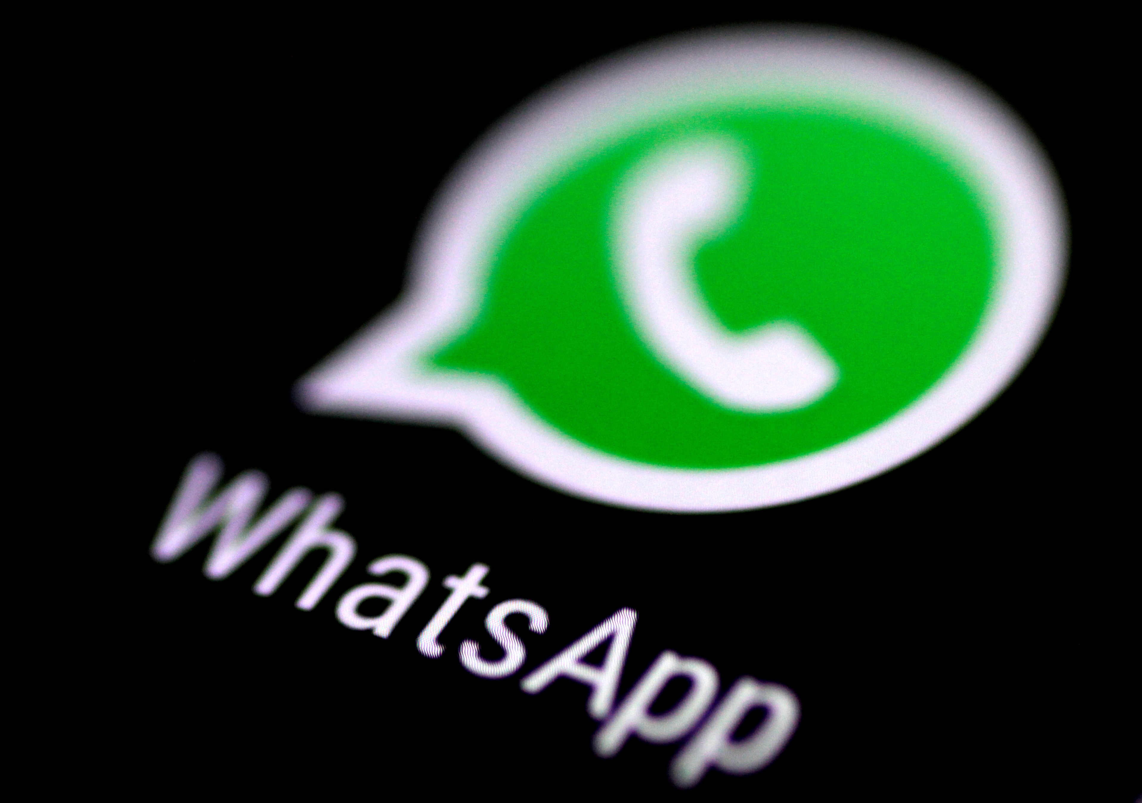 The WhatsApp messaging application is seen on a phone screen August 3, 2017.   REUTERS/Thomas White/File Photo