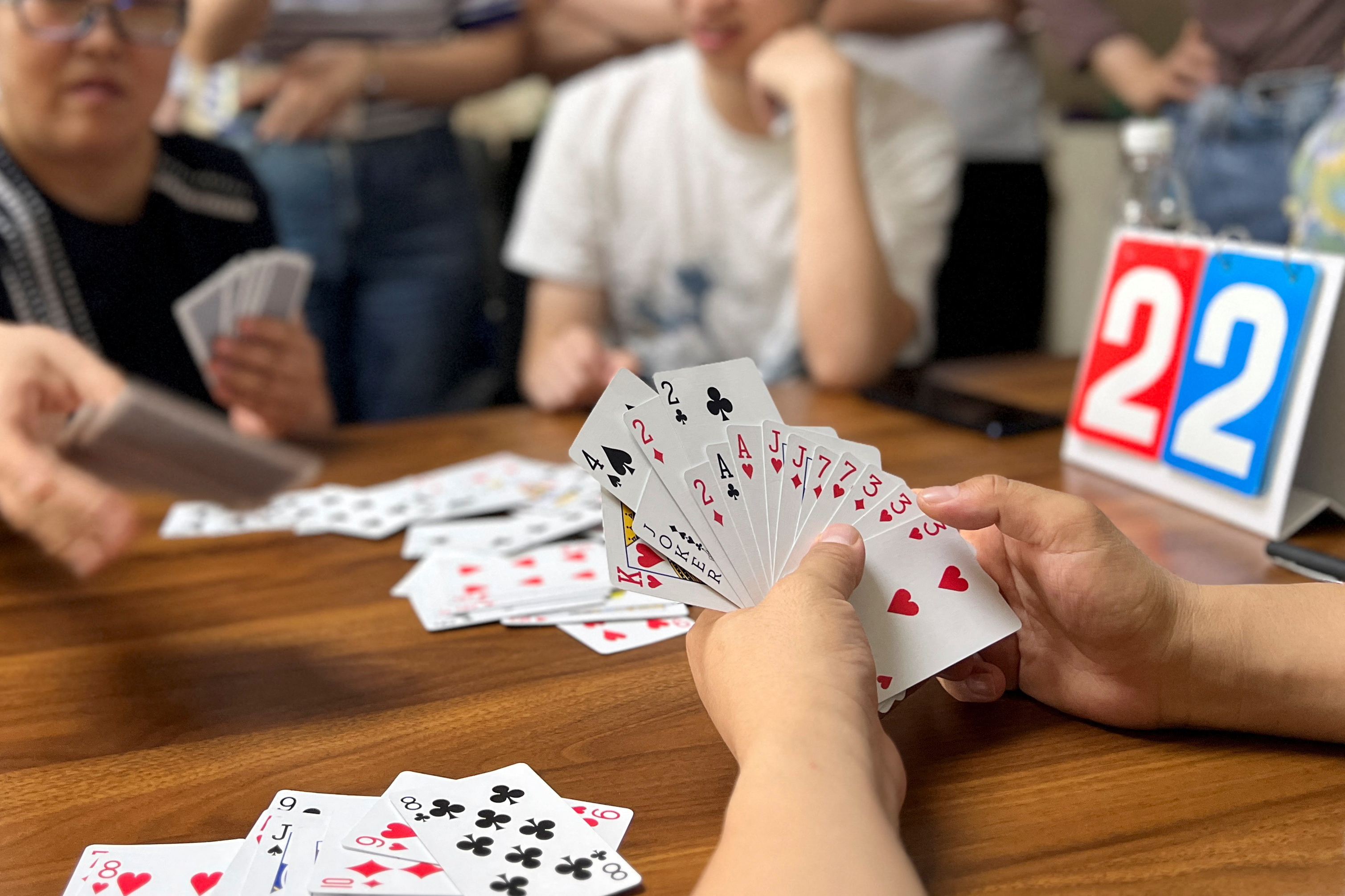 Training session for guandan, a poker-like card game, in Beijing