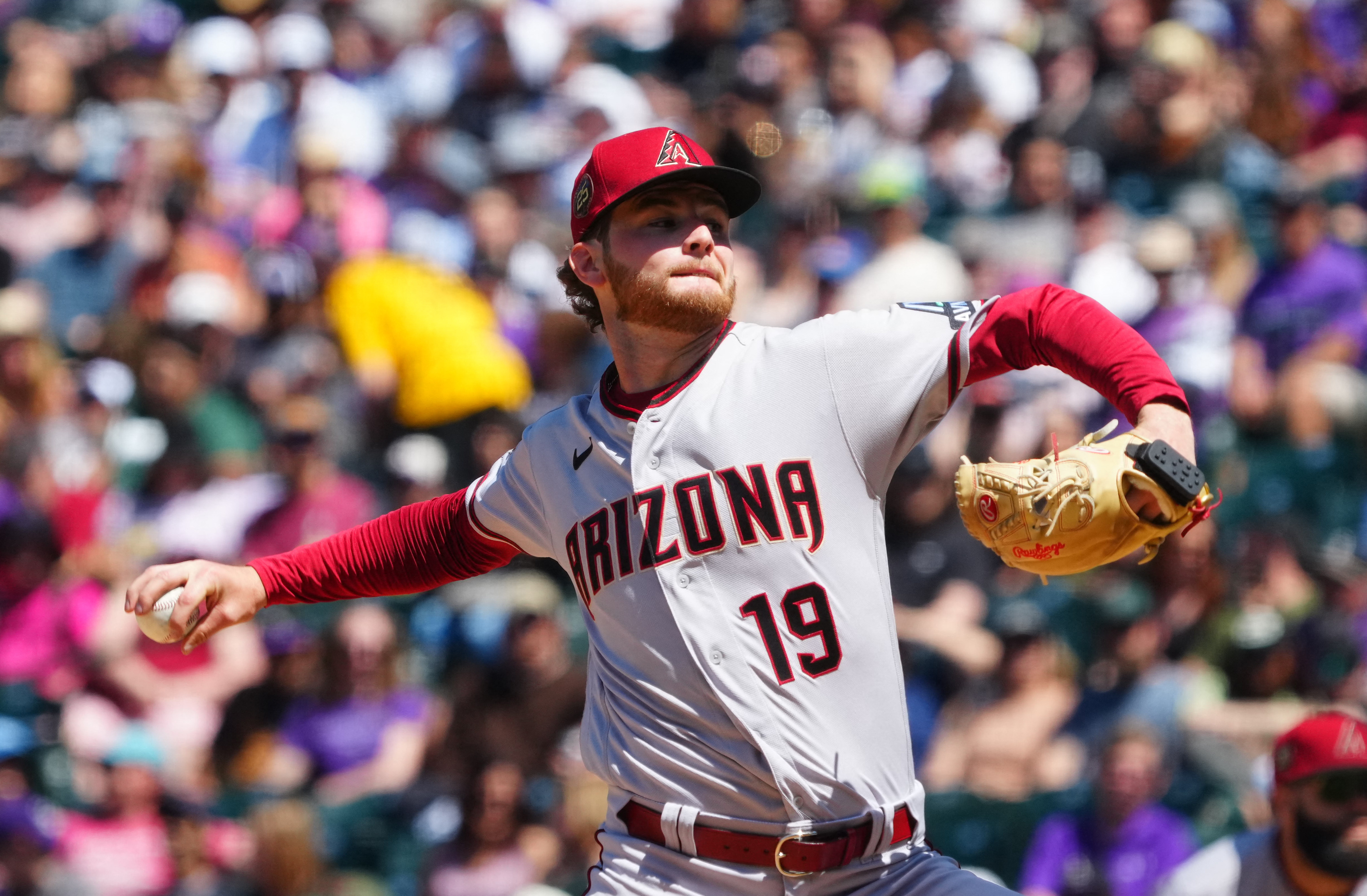 Rockies offense explodes in 12-4 win to avoid sweep