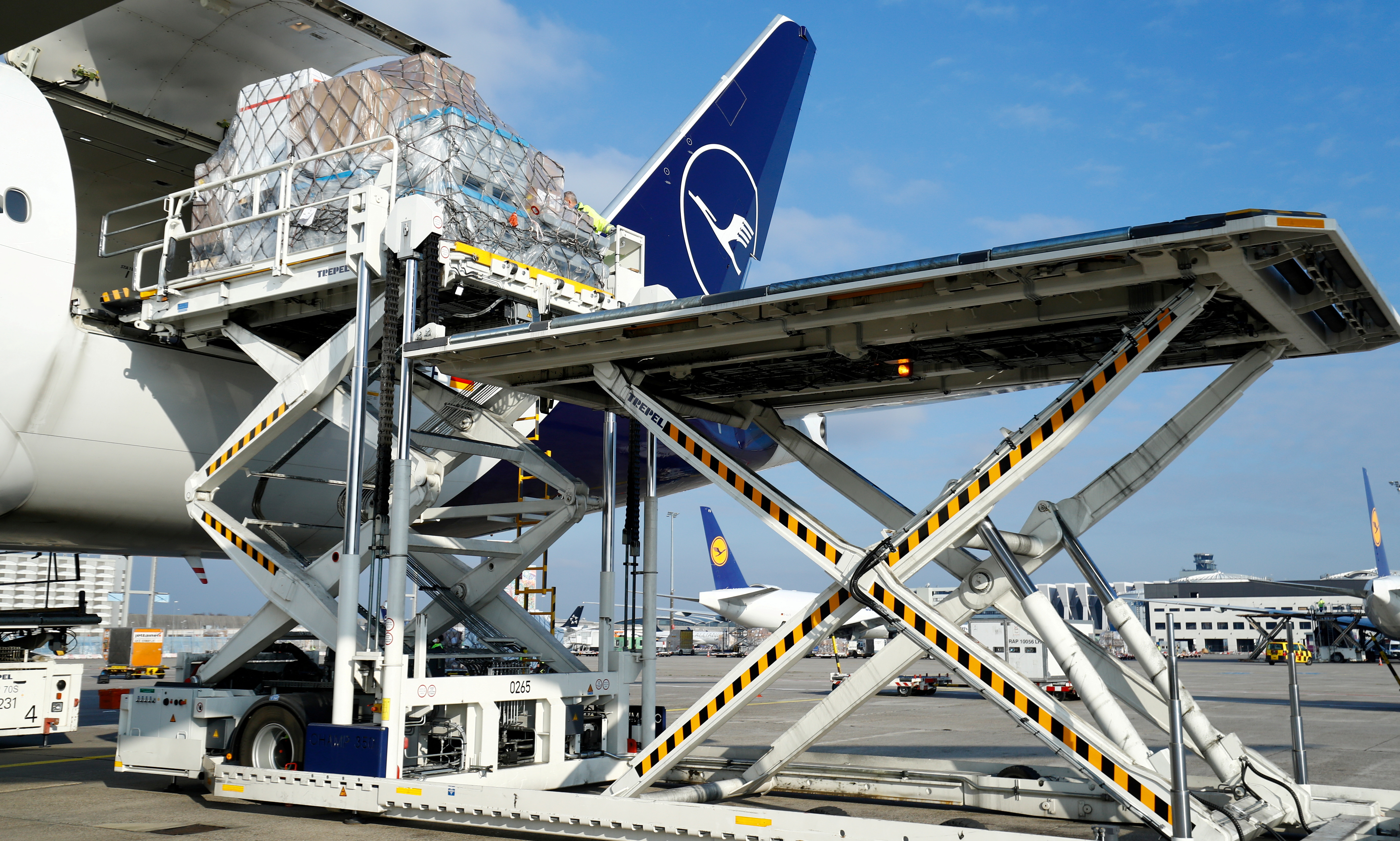 A Lufthansa CO2-neutral Boeing 777 cargo aircraft, operated with sustainable aviation fuel (SAF), is loaded at Frankfurt airport