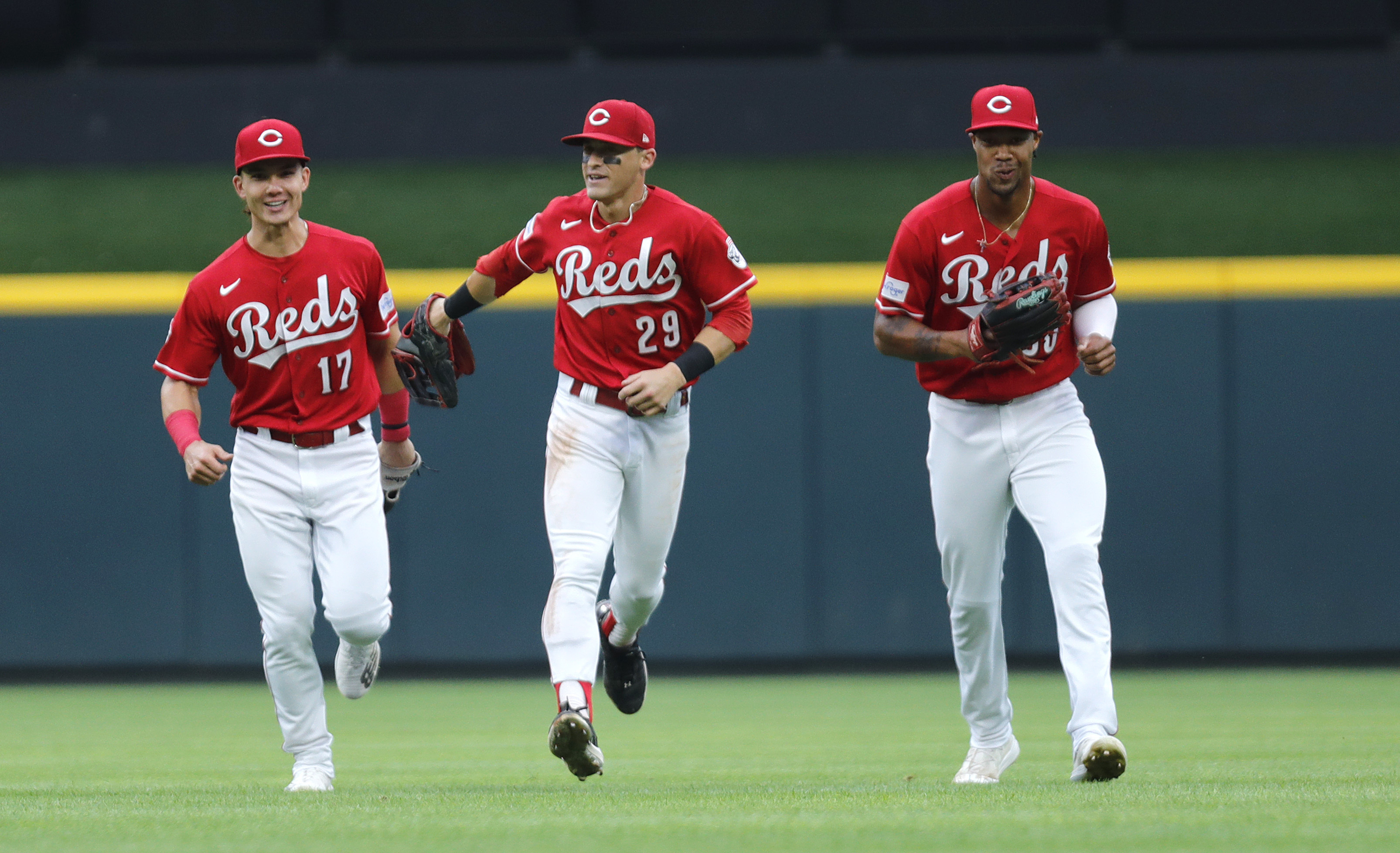 Cincinnati Reds' Stuart Fairchild (17) celebrates with first base