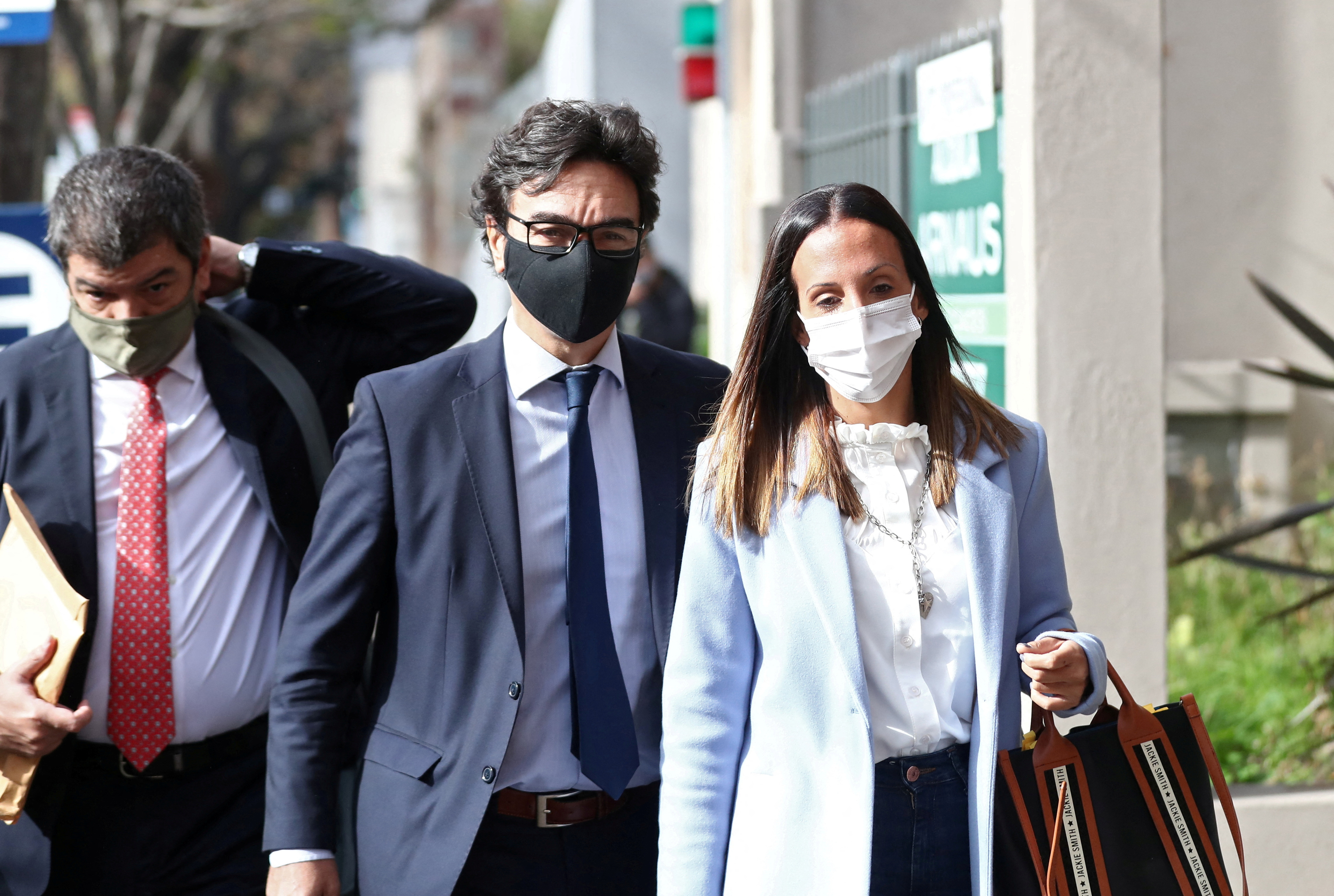 Agustina Cosachov, psychiatrist of late Argentine soccer legend Diego Armando Maradona arrives to a prosecutor's office in San Isidro, accompanied by her lawyer, Vadim Mischanchuk, in Buenos Aires