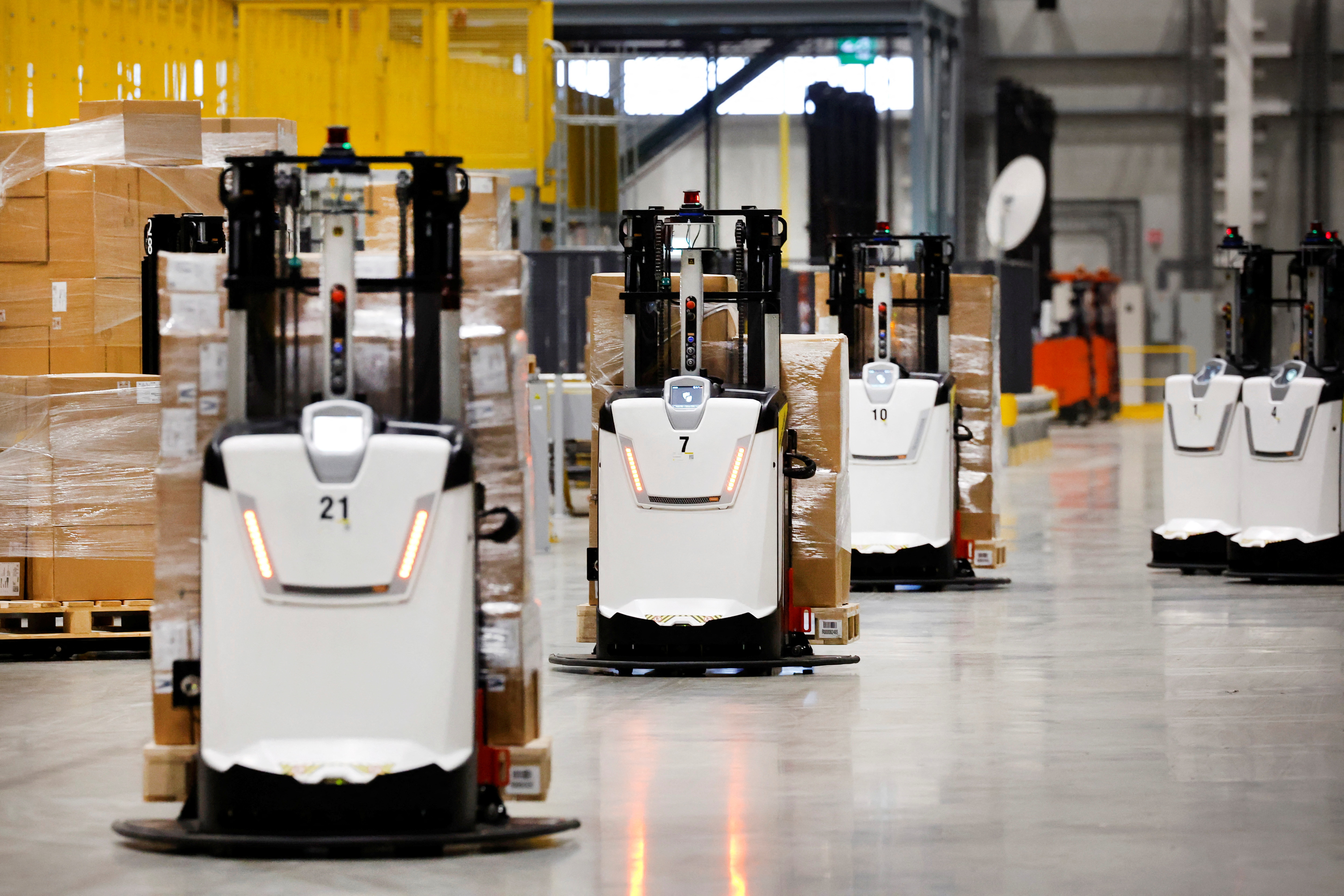 Autonomous guided vehicles are seen at Primark's warehouse in Roosendaal