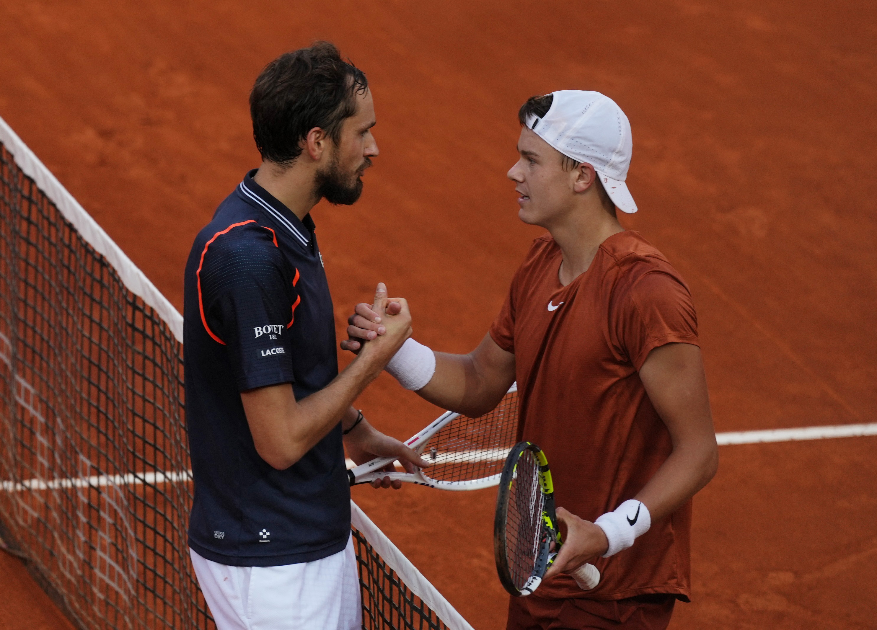 Medvedev makes his mark on clay by beating Rune for Italian Open title