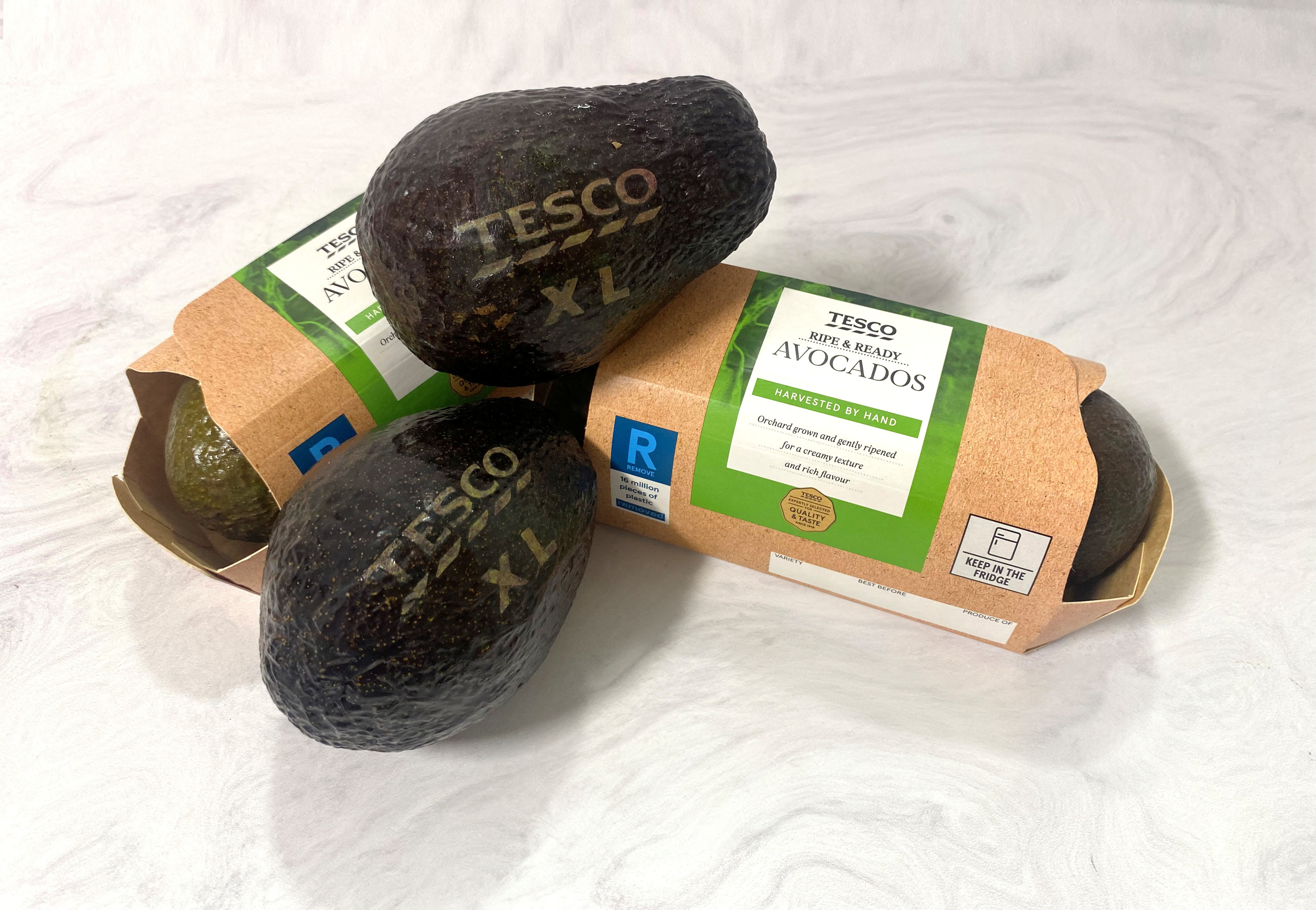 Lasered avocados are displayed by Tesco