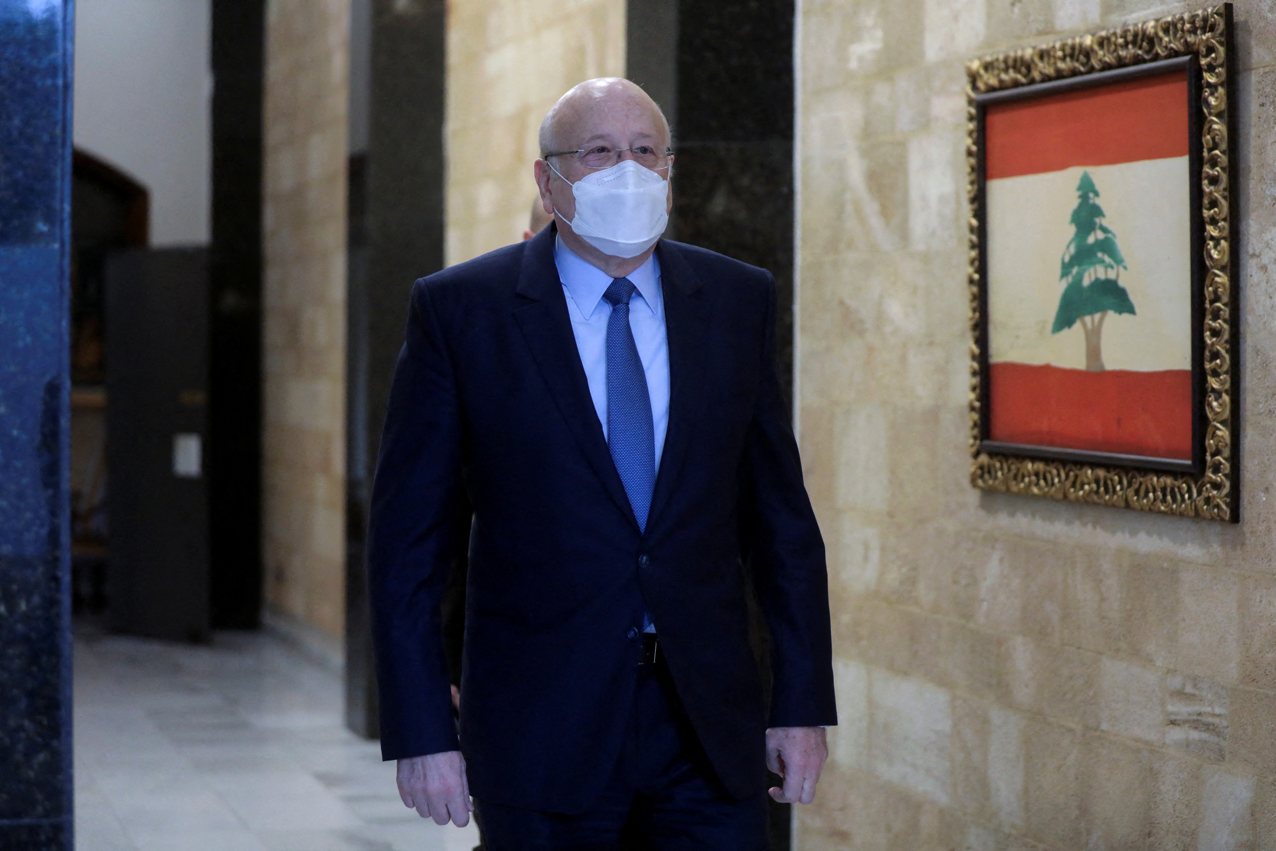 Lebanese Prime Minister Najib Mikati heads to a cabinet meeting at the presidential palace in Baabda