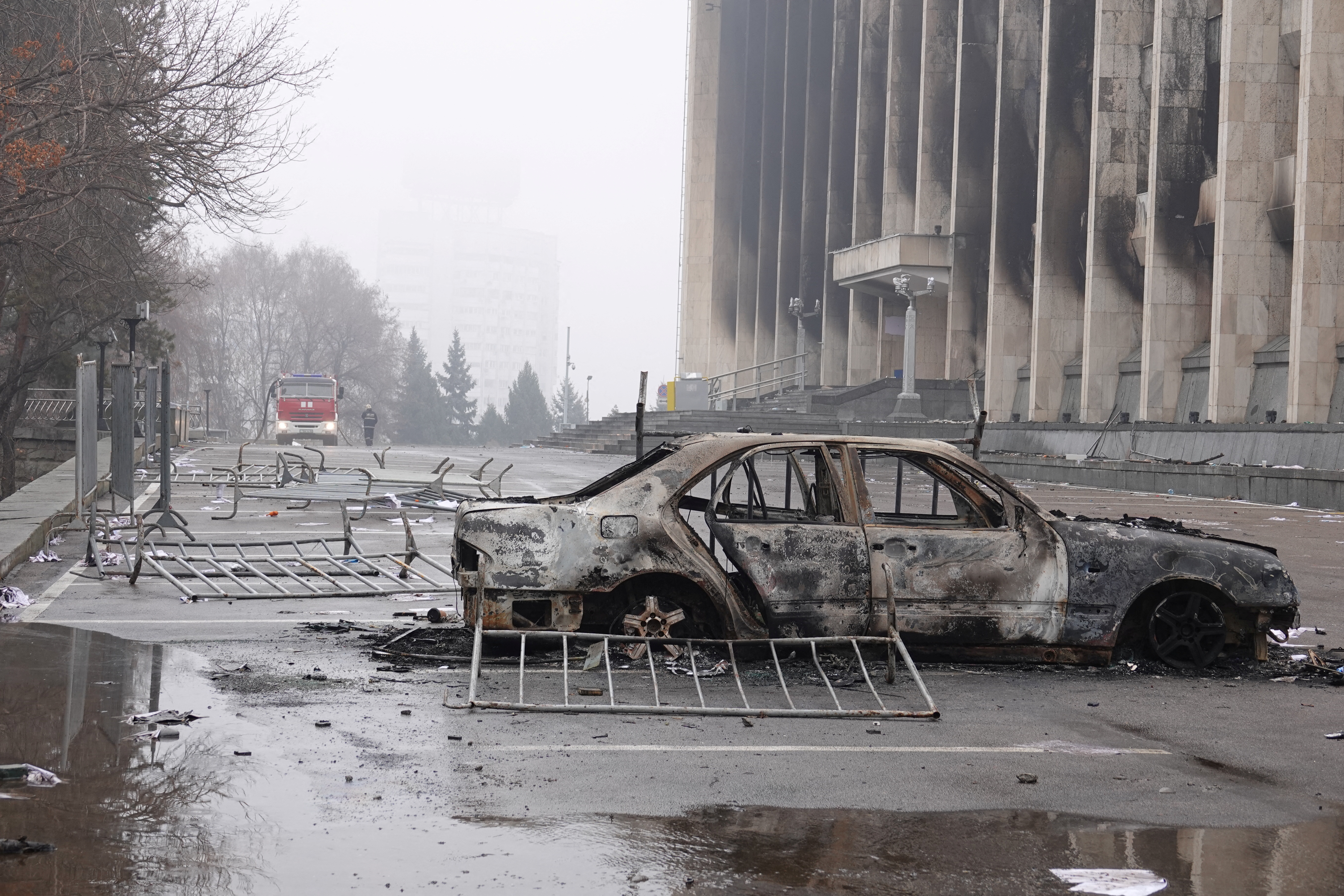 A view shows a burnt car following the protests triggered by fuel price increase outside the city administration headquarters in Almaty, Kazakhstan January 7, 2022. REUTERS/Stringer