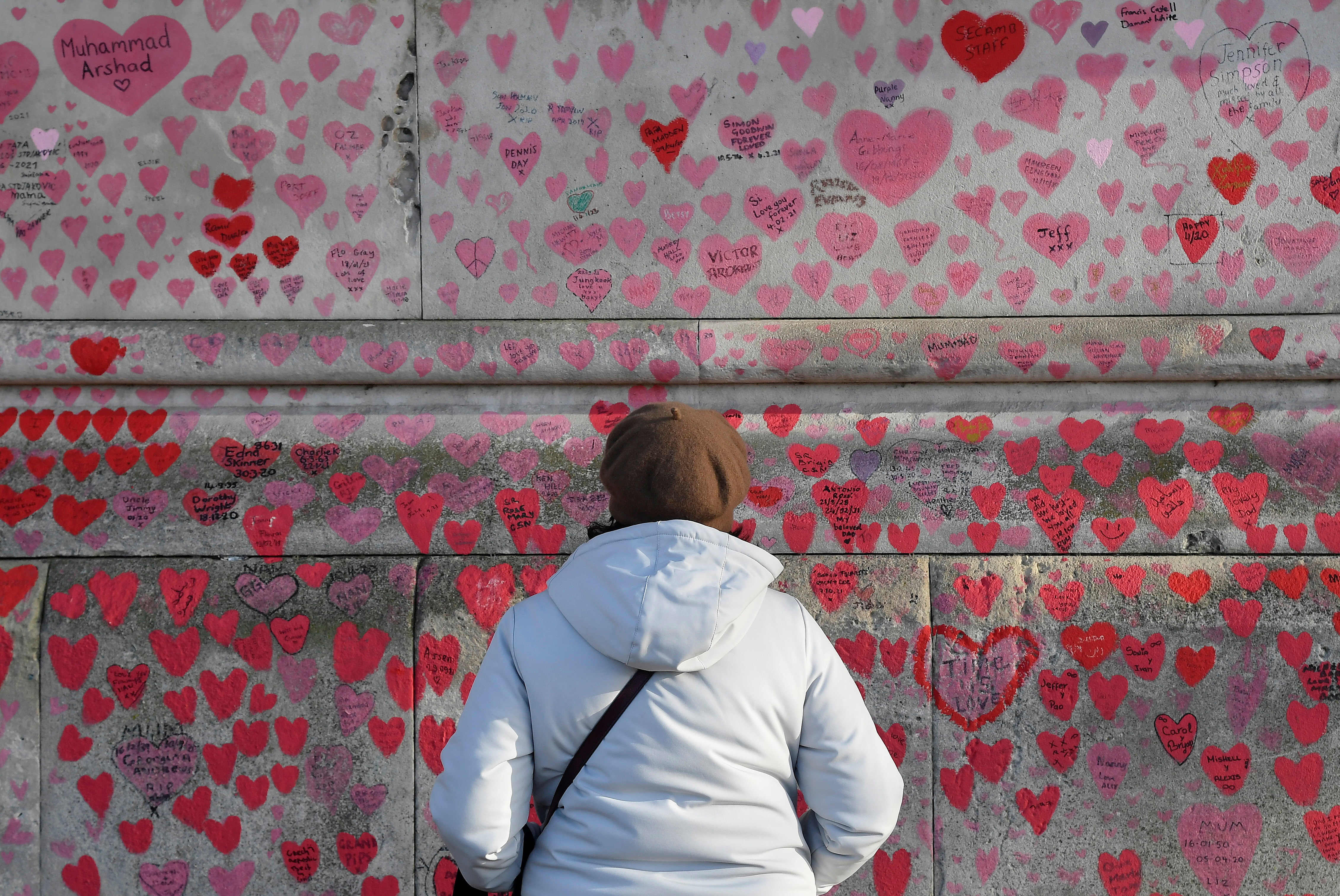 National Covid Memorial Wall, a dedication of thousands of hand-painted hearts and messages for those in the UK who have died from COVID-19, is seen amid the coronavirus disease pandemic in London
