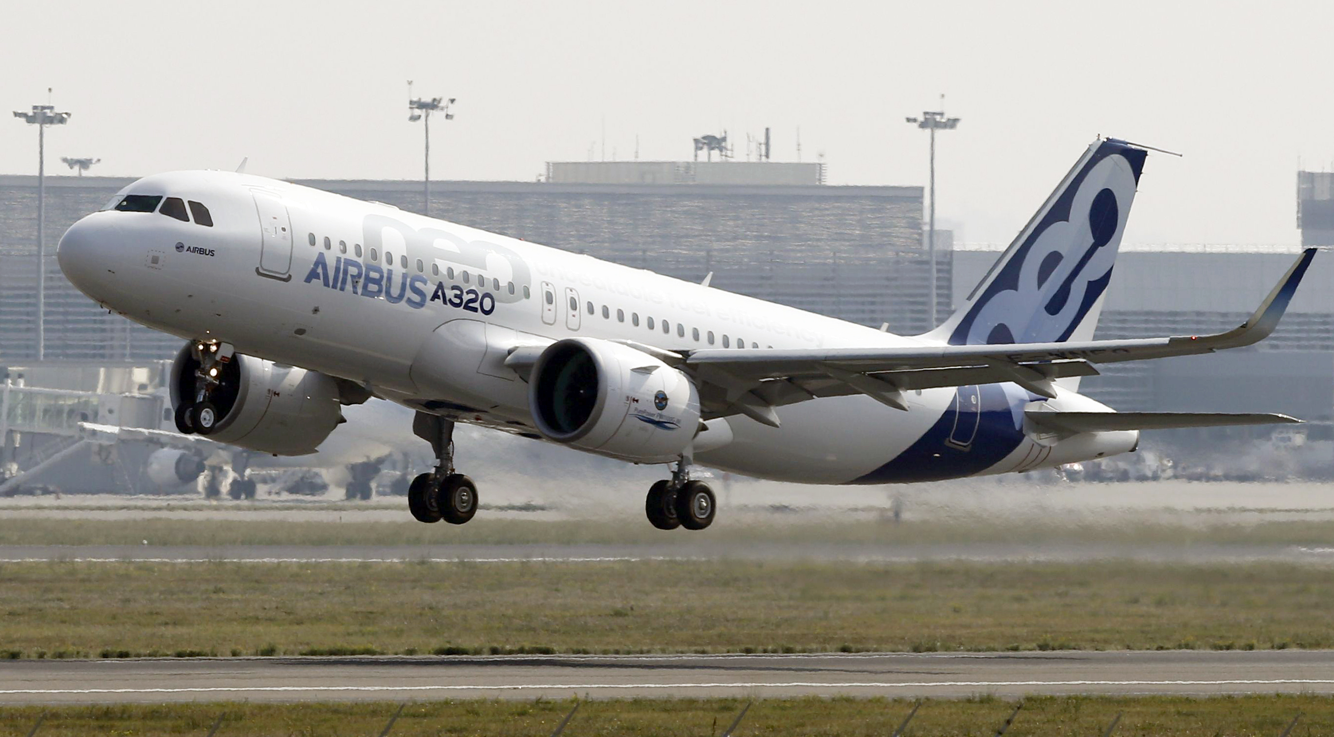 The Airbus A320neo takes off during its first flight event in Colomiers near Toulouse, southwestern France