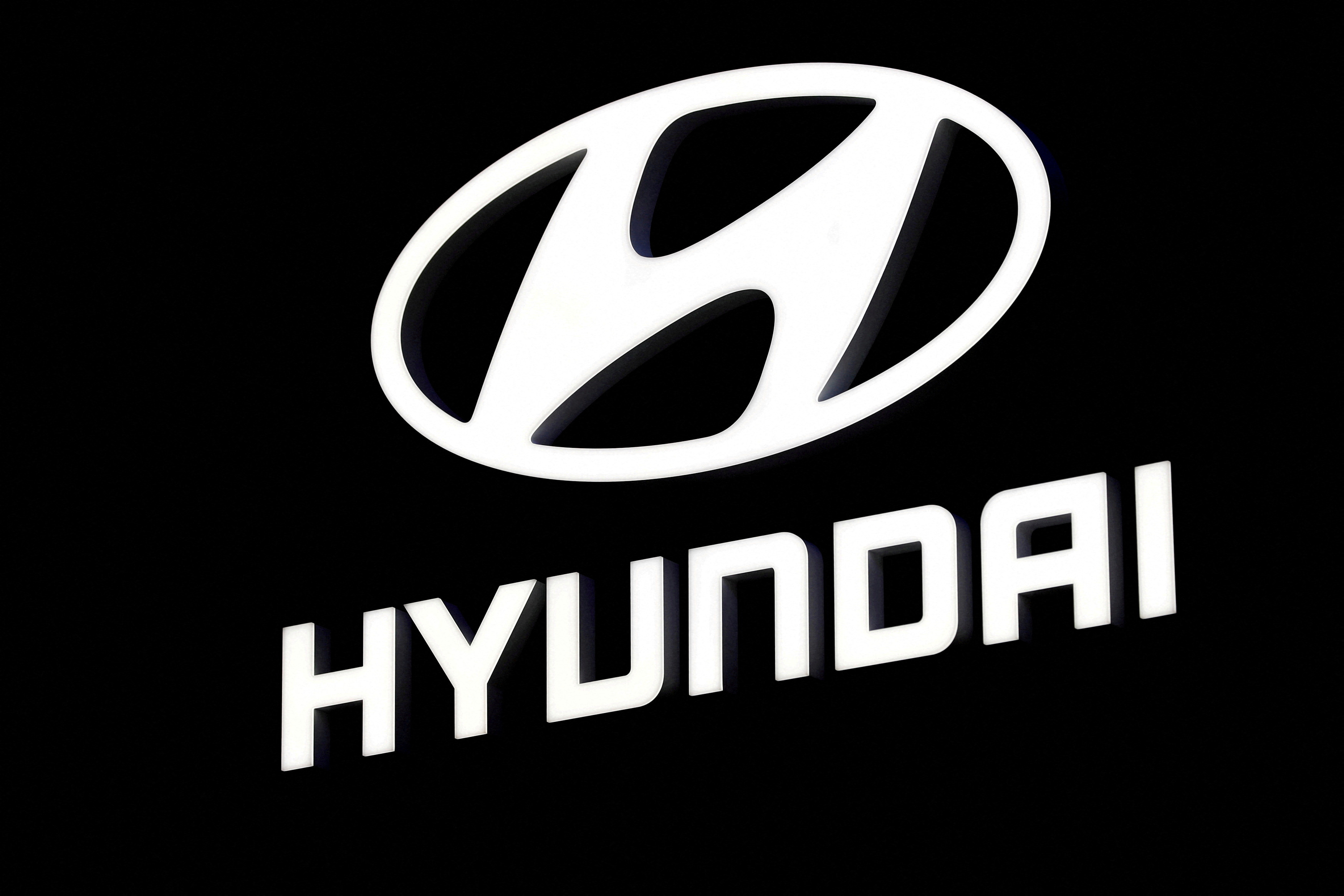 A Hyundai booth displays the company logo at the North American International Auto Show in Detroit