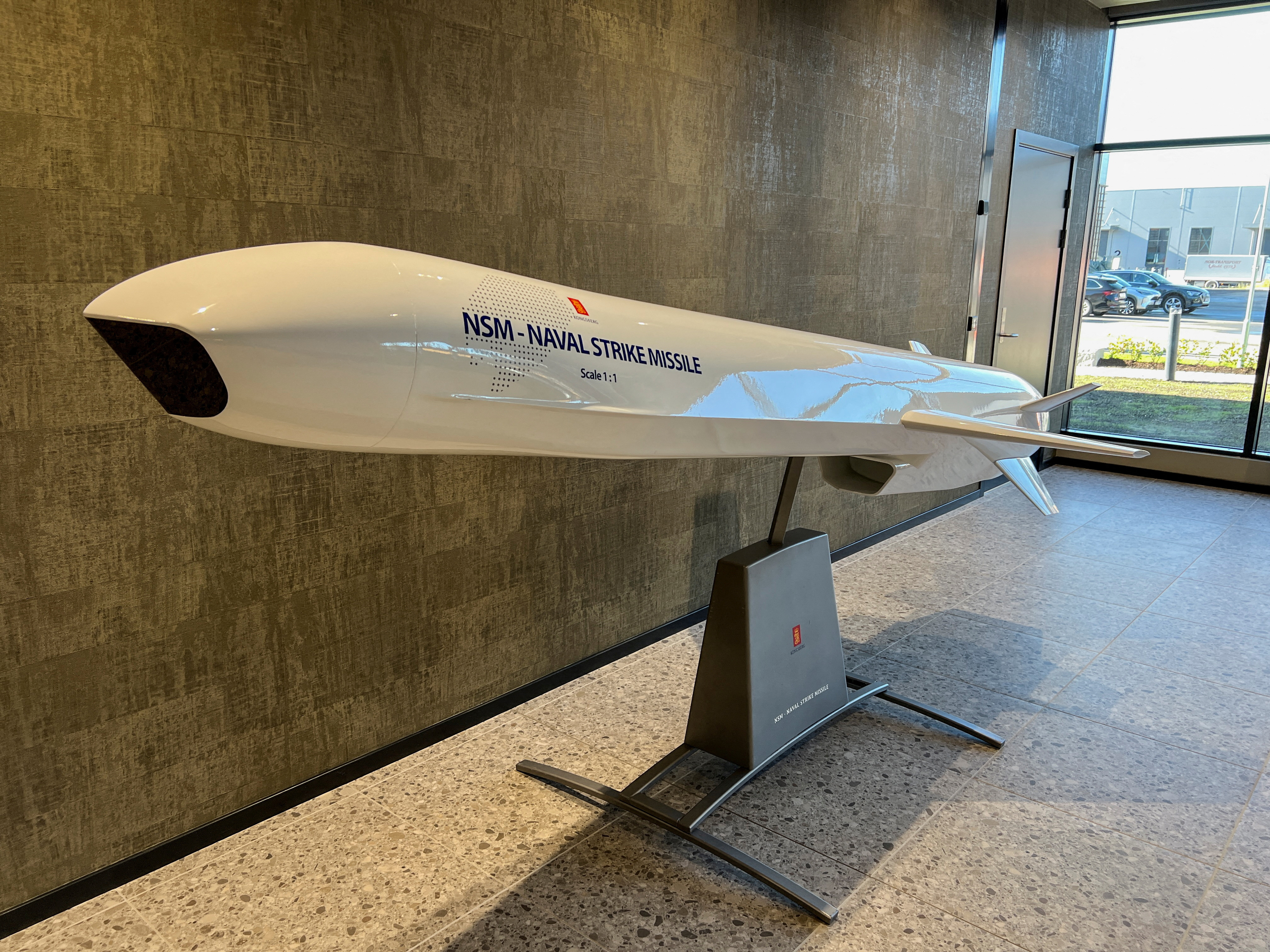 A model of the Naval Strike Missile, an anti-ship missile produced by Norway's Kongsberg, is showcased at the entrance of Kongsberg's new missile factory in Kongsberg