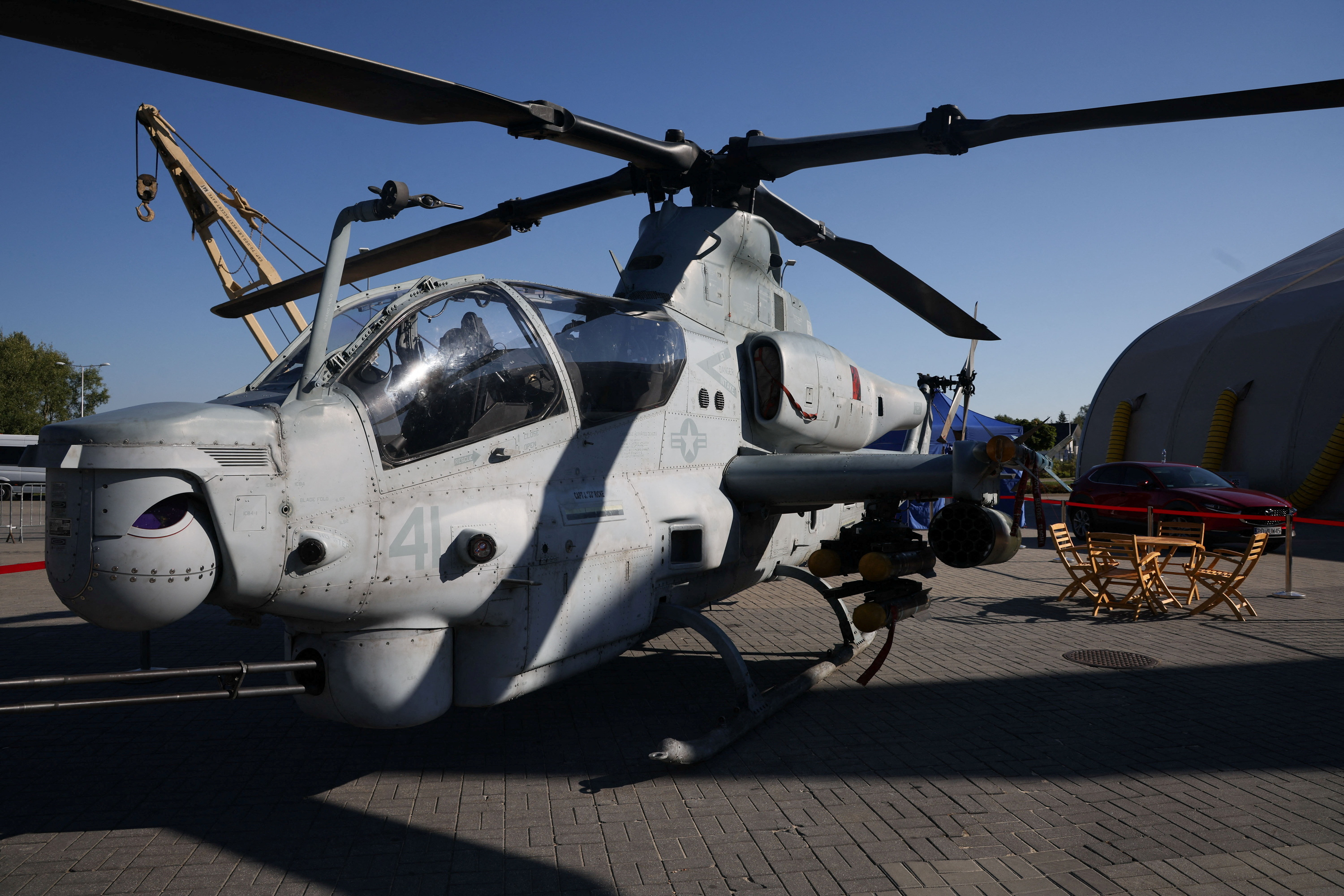 A Bell helicopter Ah-1Z Viper helicopter is seen outside a hall at the 30th International Defence Industry Exhibition in Kielce