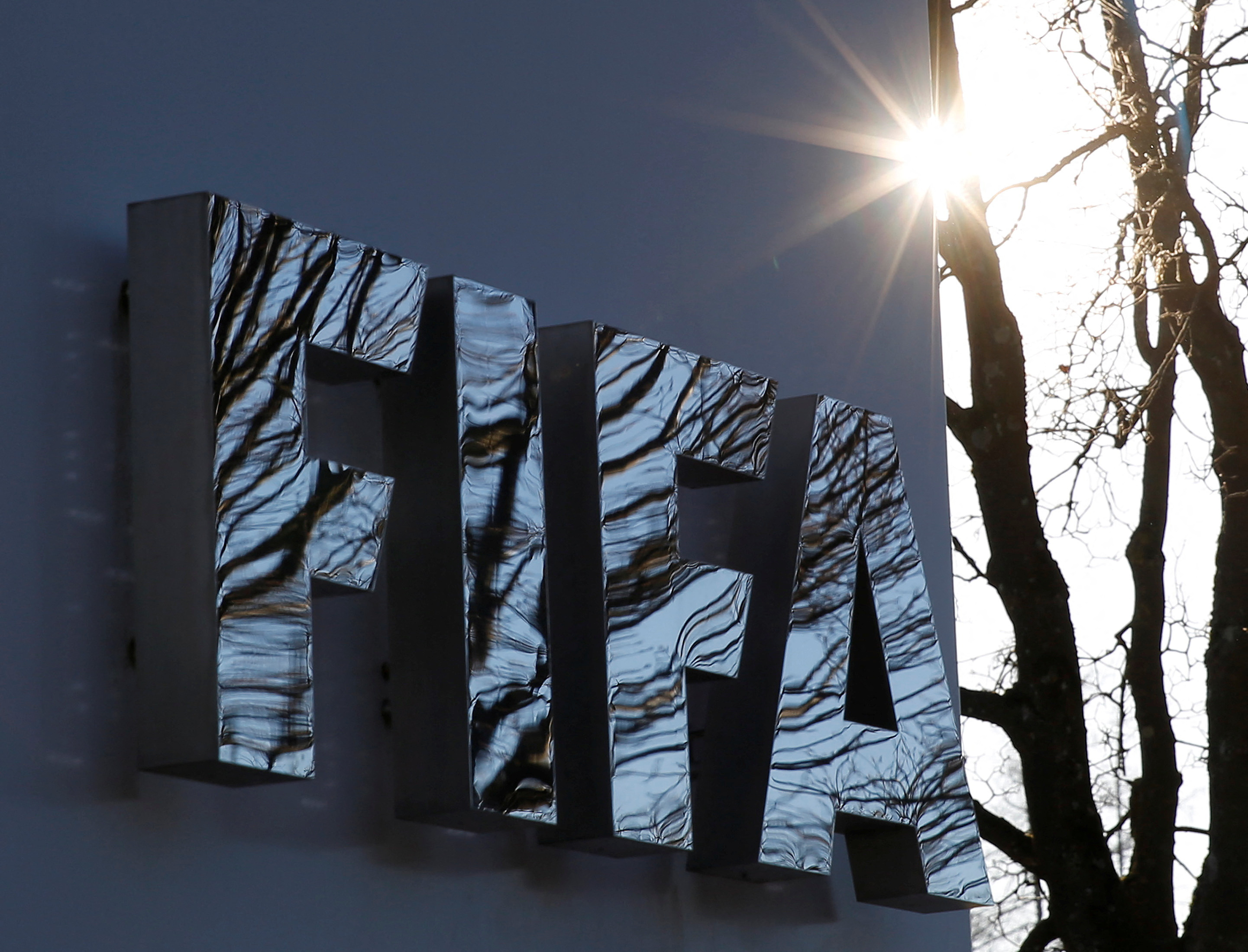 The FIFA logo is seen outside the FIFA headquarters in Zurich
