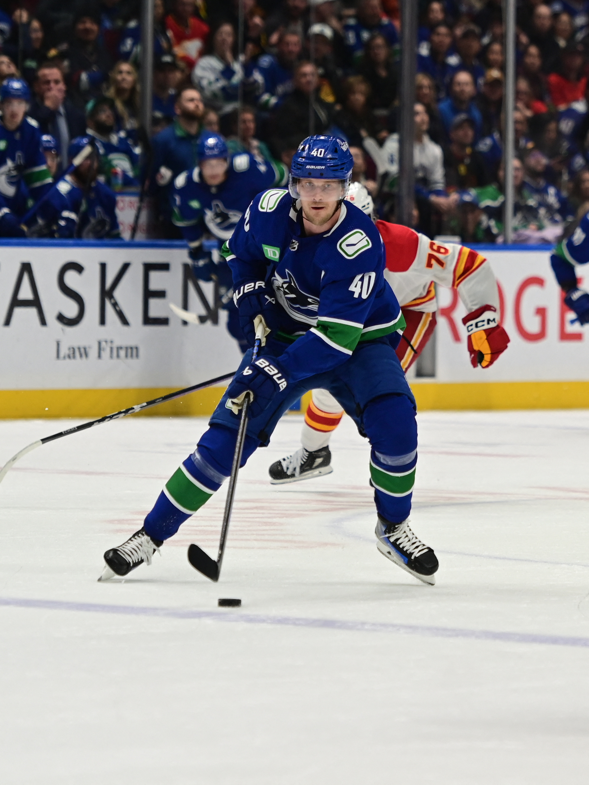 Nils Hoglander Scores Twice As Canucks Top Flames | Reuters