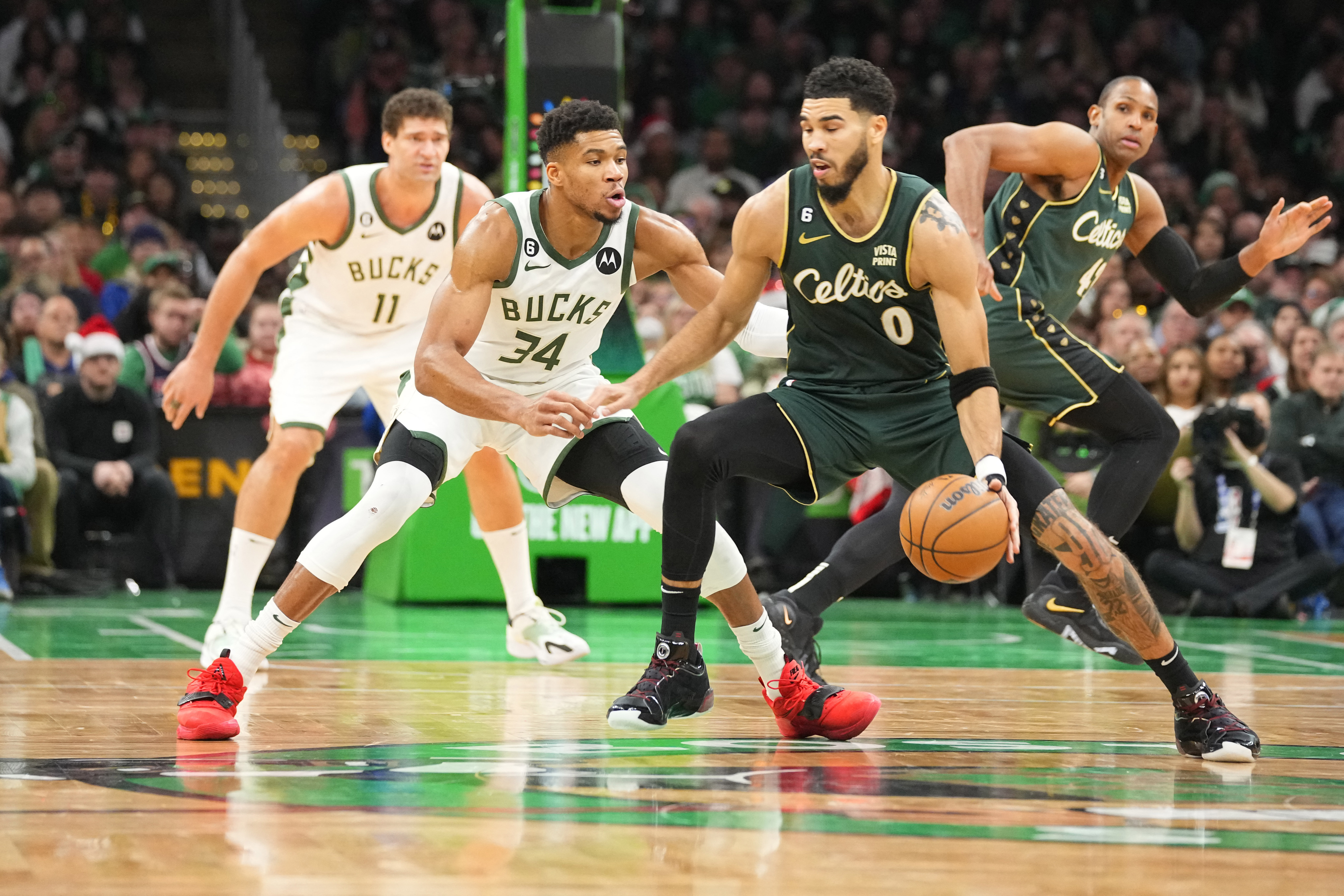 A detailed view of the shoes worn by Boston Celtics forward Jayson Tatum  (0) during the second half of an NBA basketball game against the Milwaukee  Bucks Saturday, Dec. 25, 2021, in