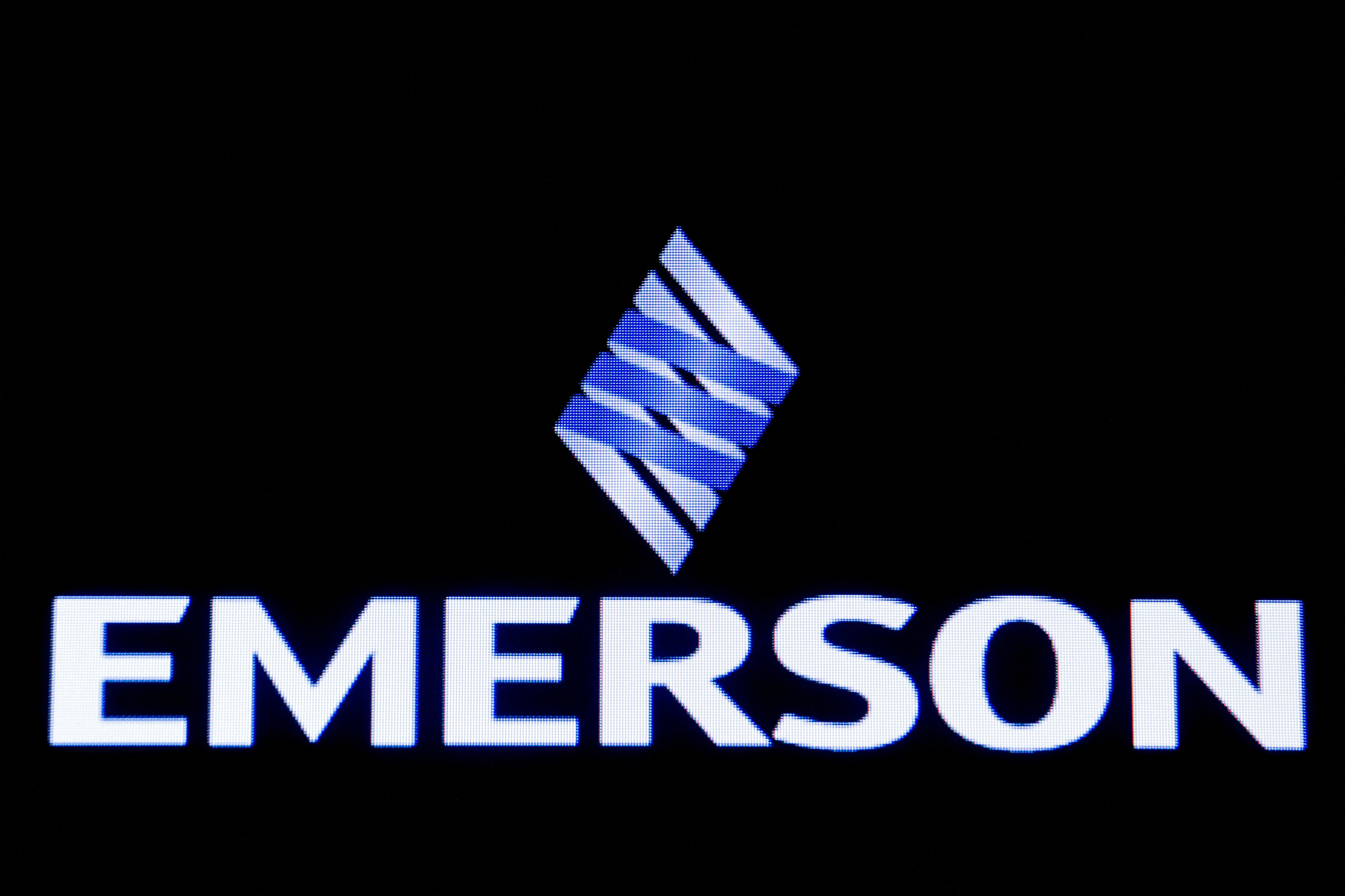 Emerson Electric Co is displayed on a screen on the floor at the NYSE in New York
