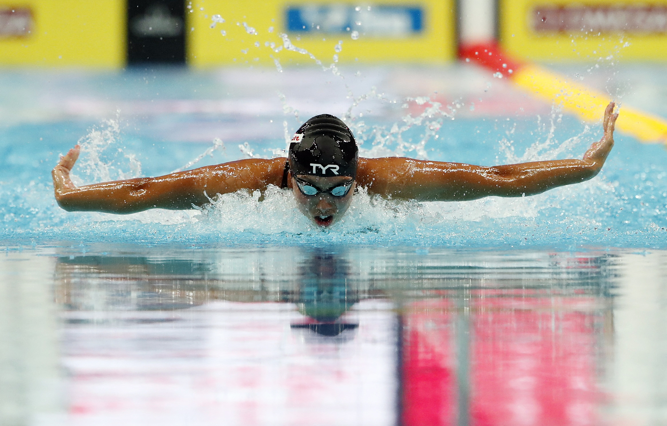 Americans Huske, Dressel power to butterfly golds at world championships