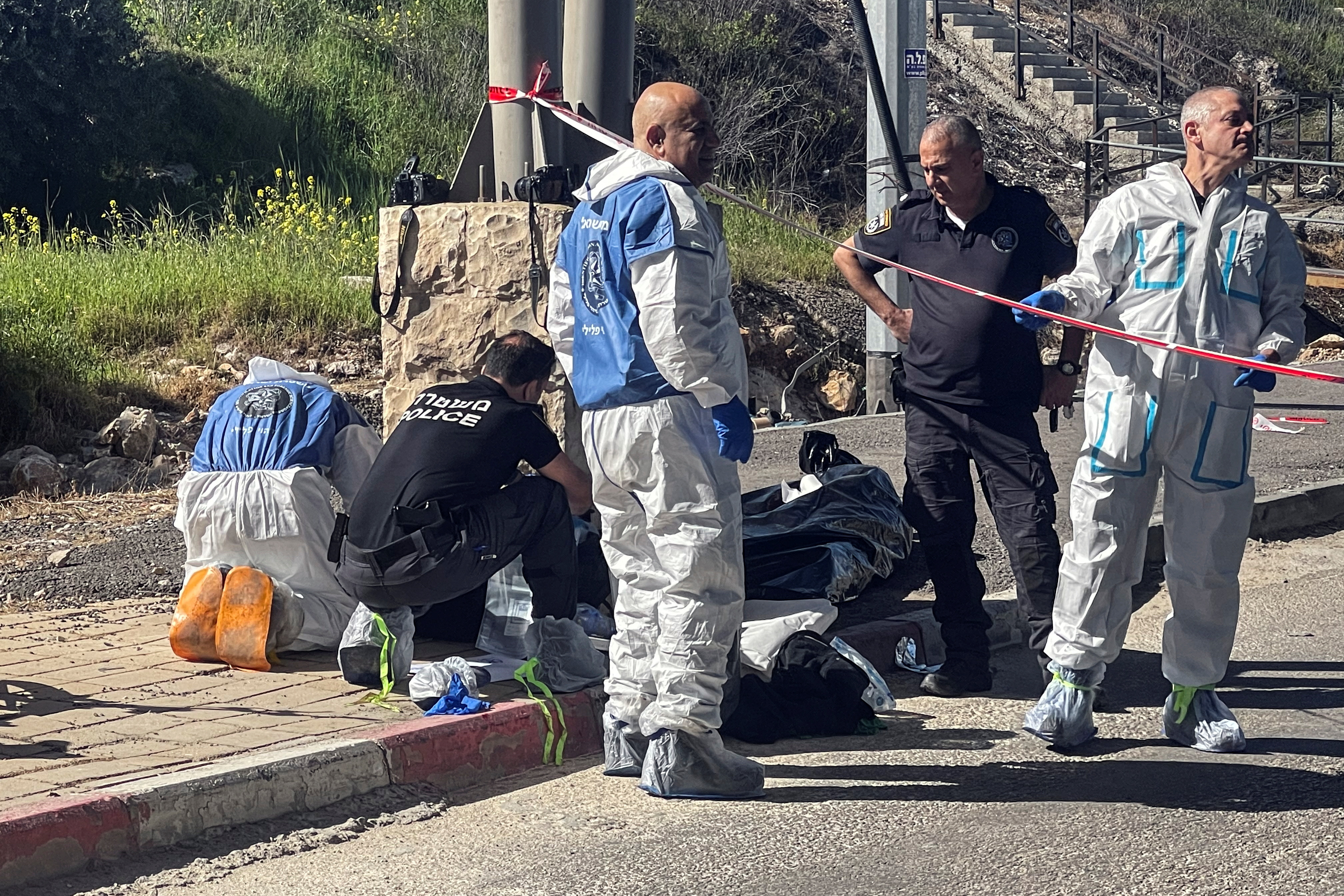 A suspected attack at a checkpoint outside of Jerusalem, in the Israeli-occupied West Bank