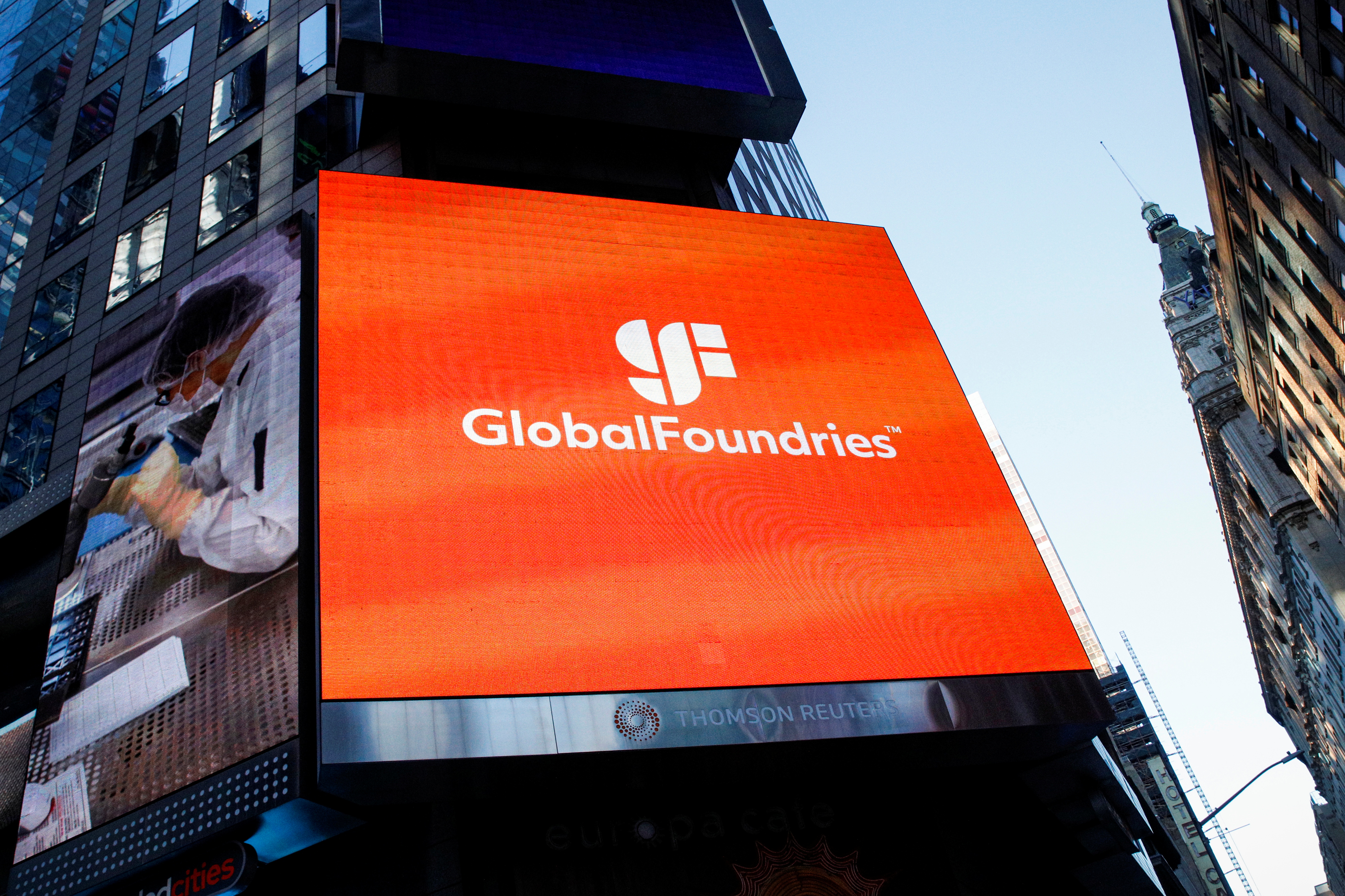 Screen displays the company logo for semiconductor and chipmaker, GlobalFoundries Inc. during the company's IPO at the Nasdaq MarketSite in Times Square in New York