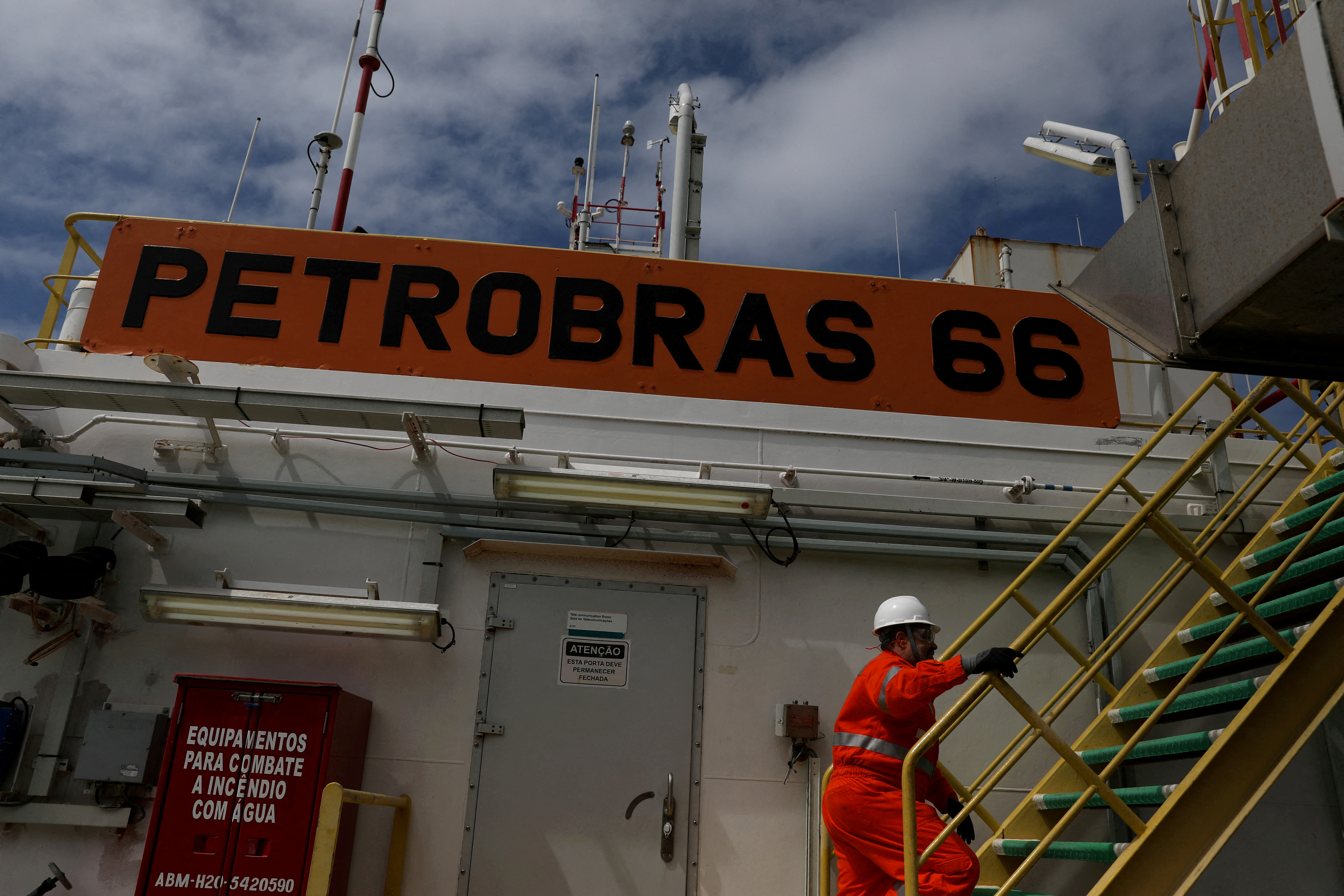 A worker walks inside the Brazil's Petrobras P-66 oil rig in the offshore Santos basin in Rio de Janeiro