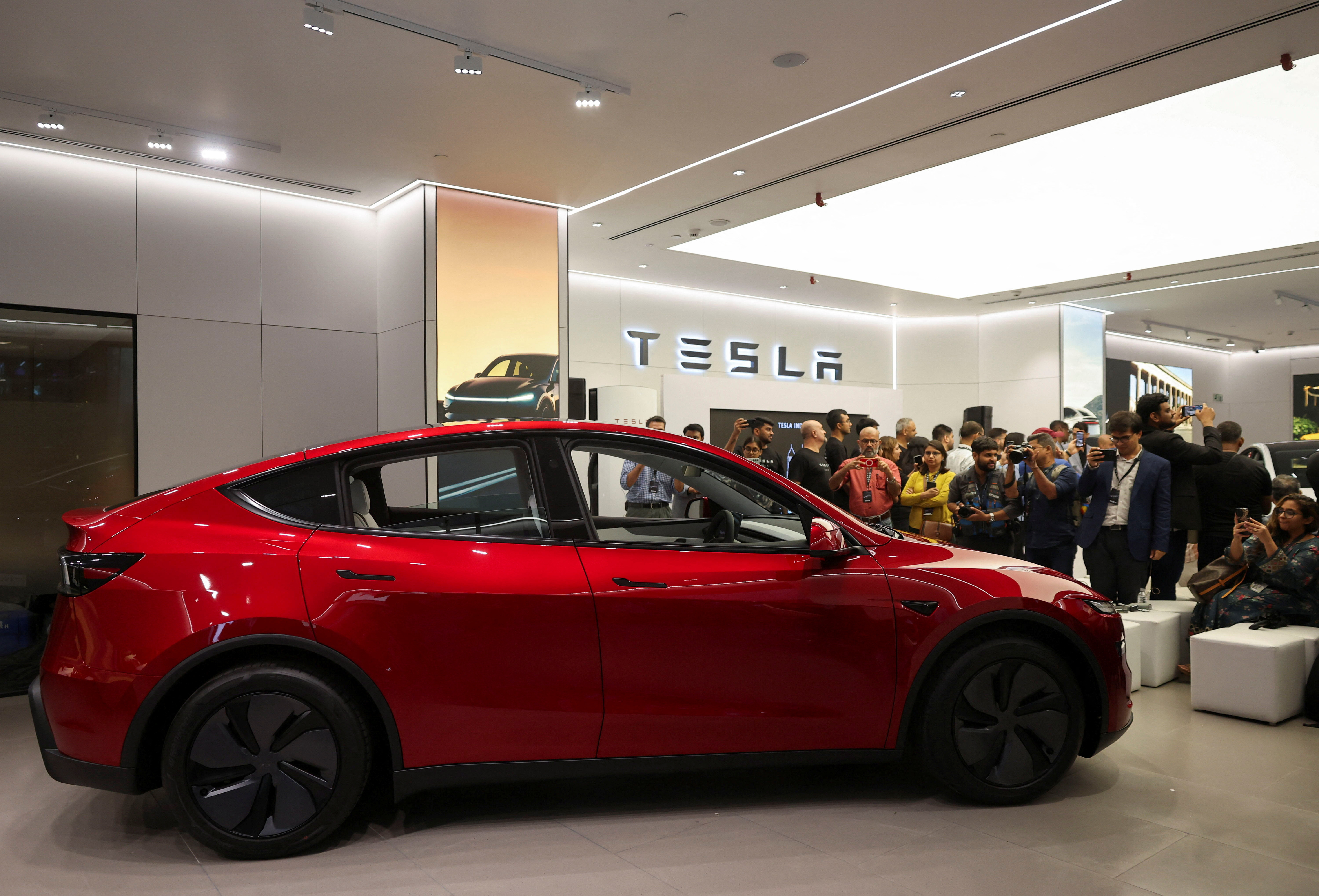 Tesla enters India with $70,000 Model Y as Musk yields to steep tariffs |  Reuters