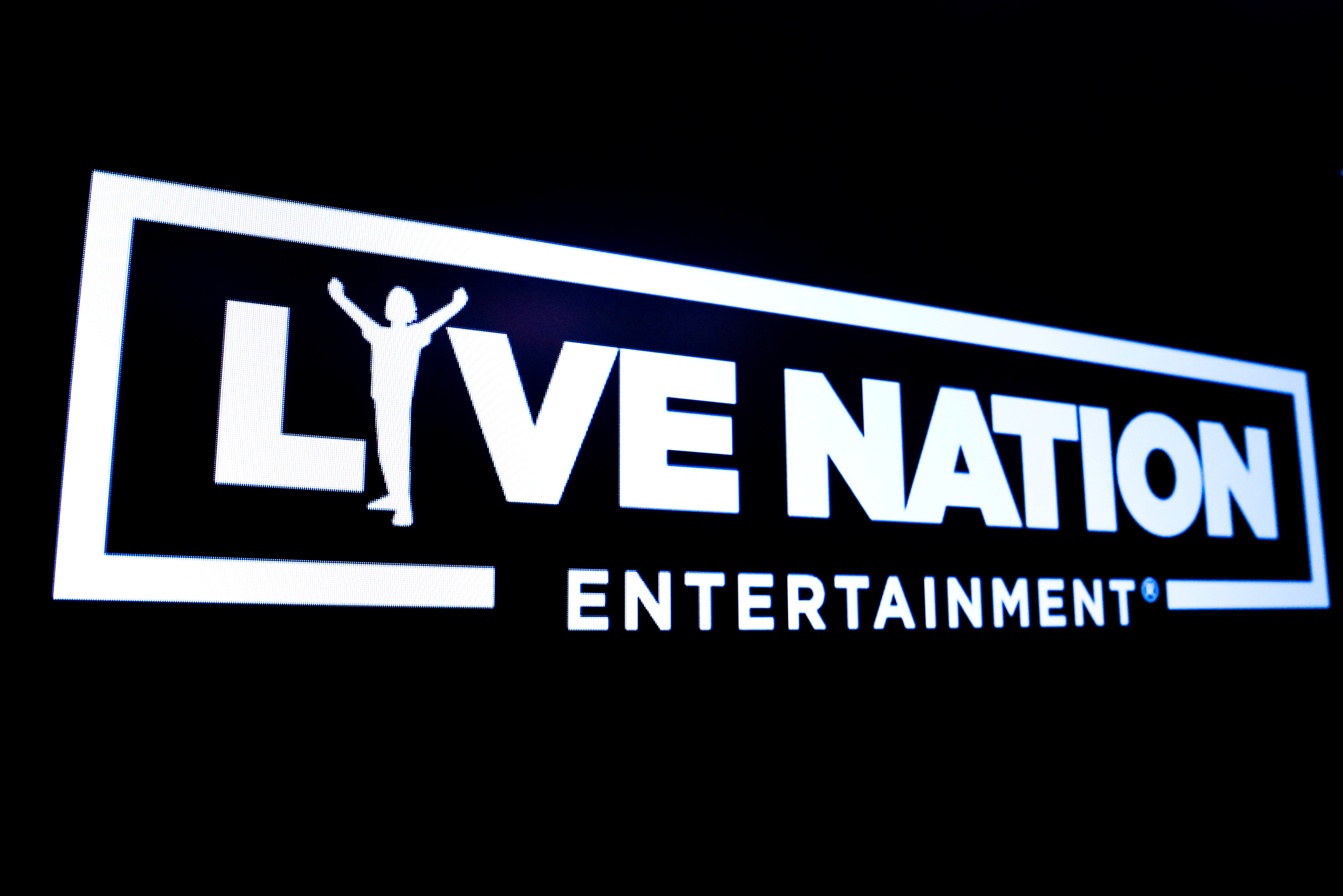 The logo for Live Nation Entertainment is displayed on a screen on the floor at the NYSE in New York