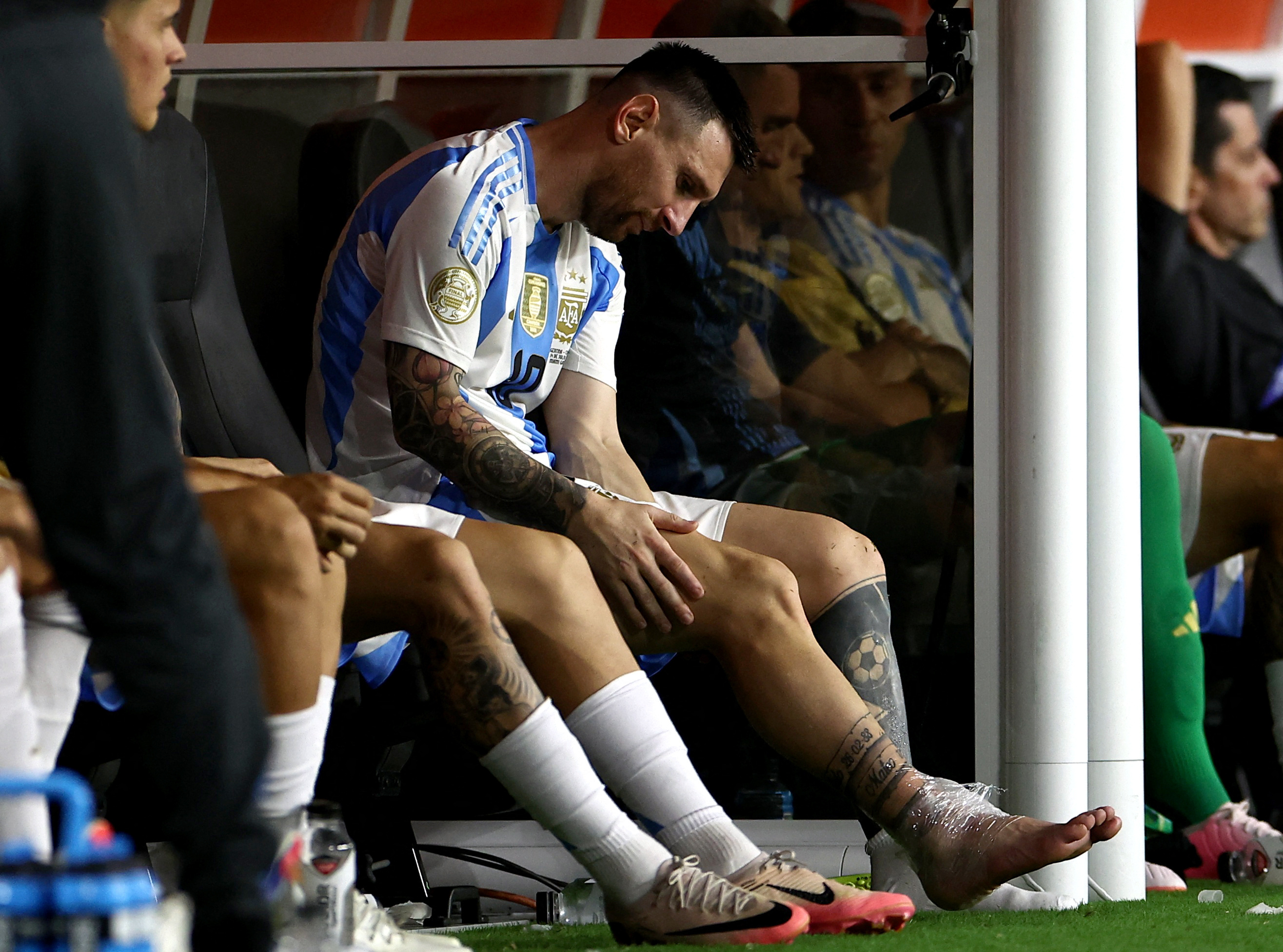 Argentina's Messi goes off injured in Copa final Reuters