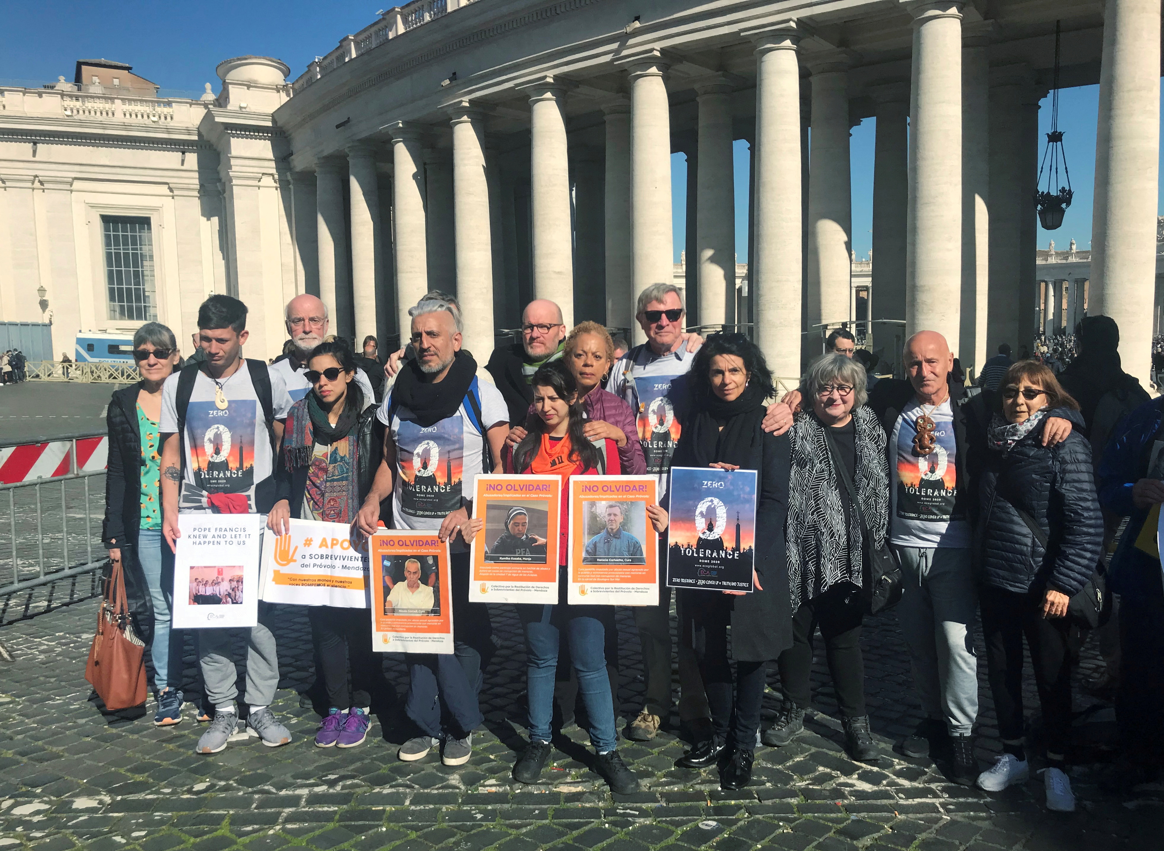 Victims of abuse by Roman Catholic priests pose with demands at the Vatican